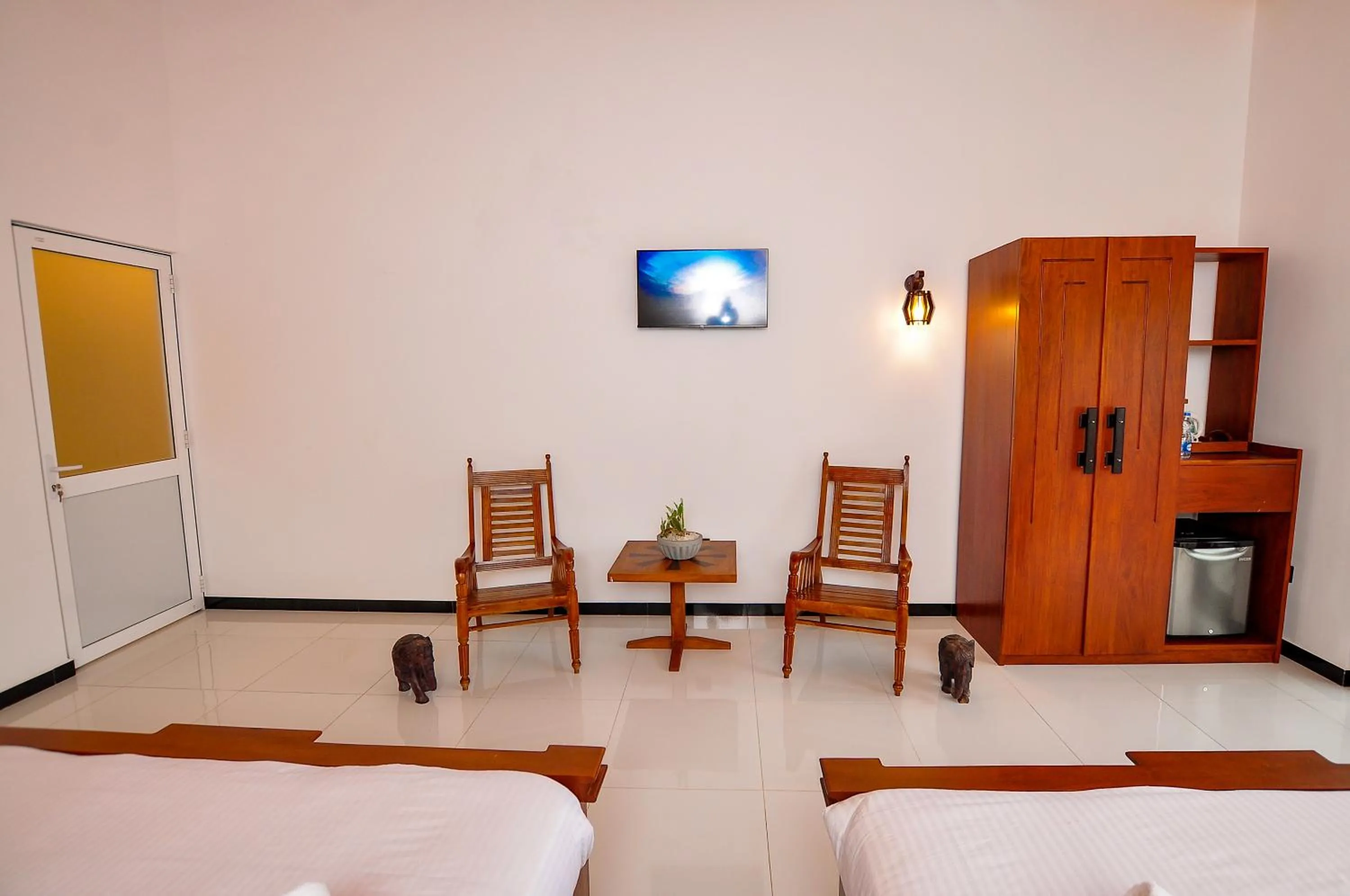 Seating area, Bed in Sachinro Hotel Mirissa