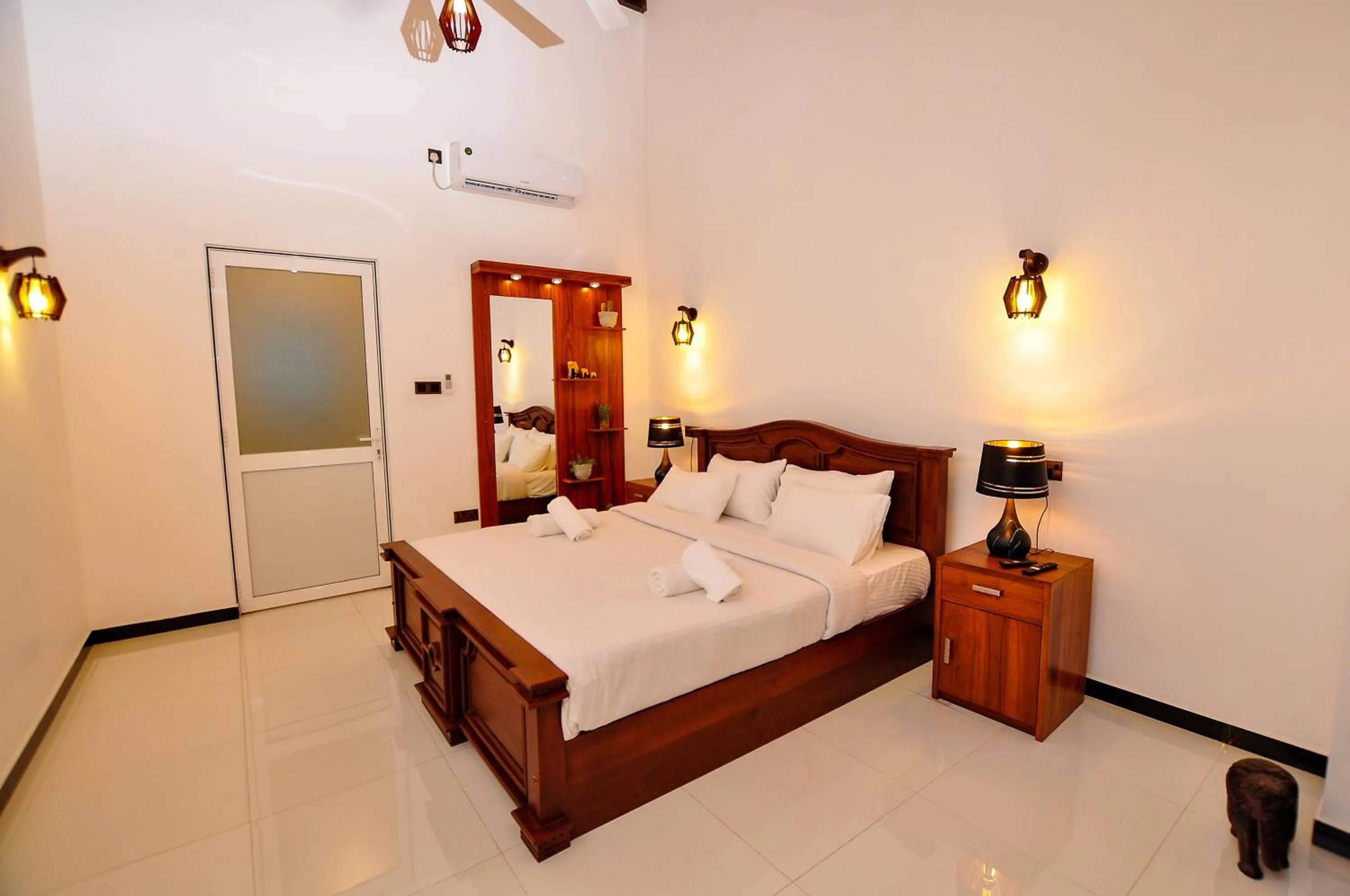 Bed in Sachinro Hotel Mirissa