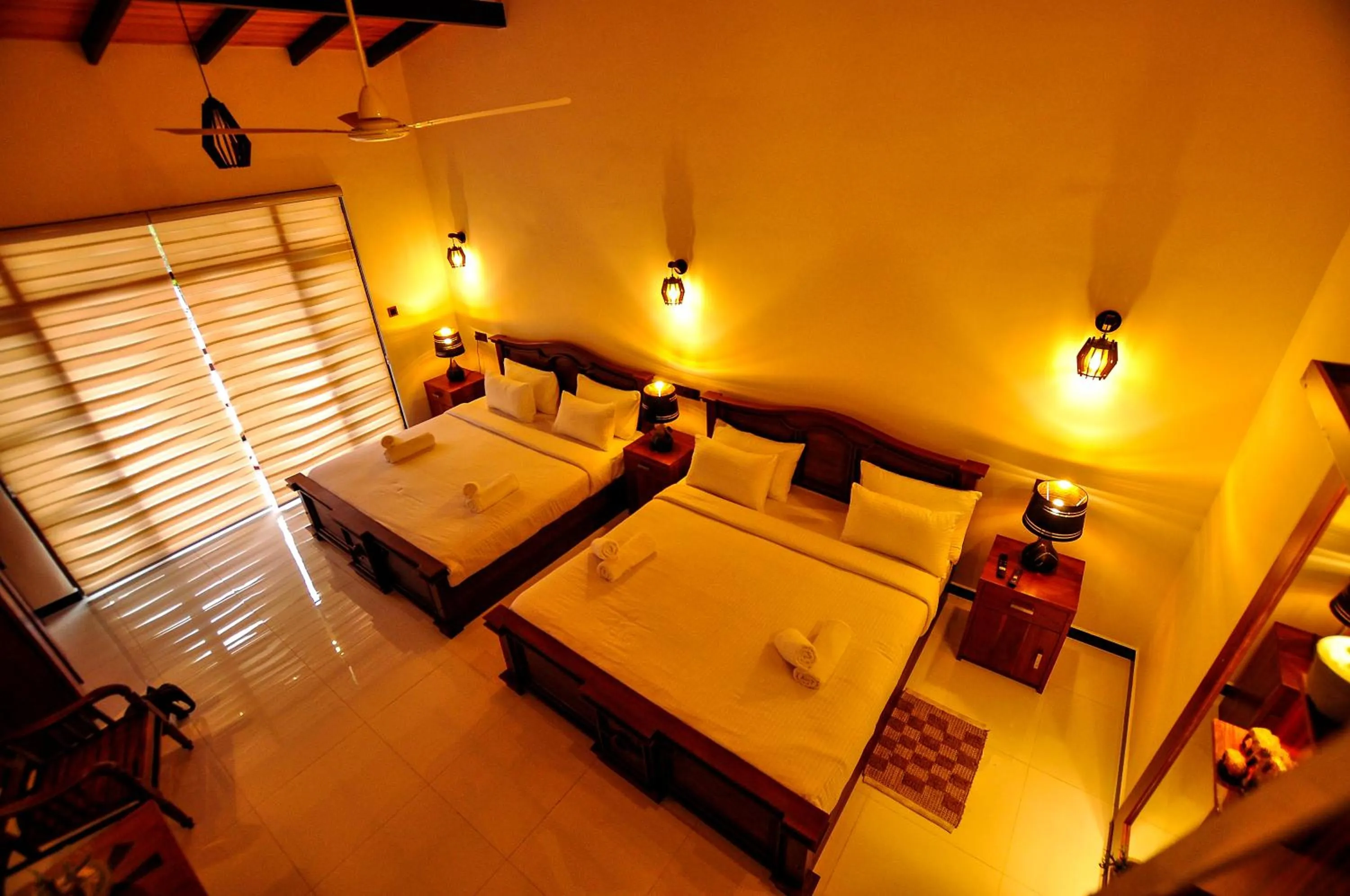 Bed in Sachinro Hotel Mirissa