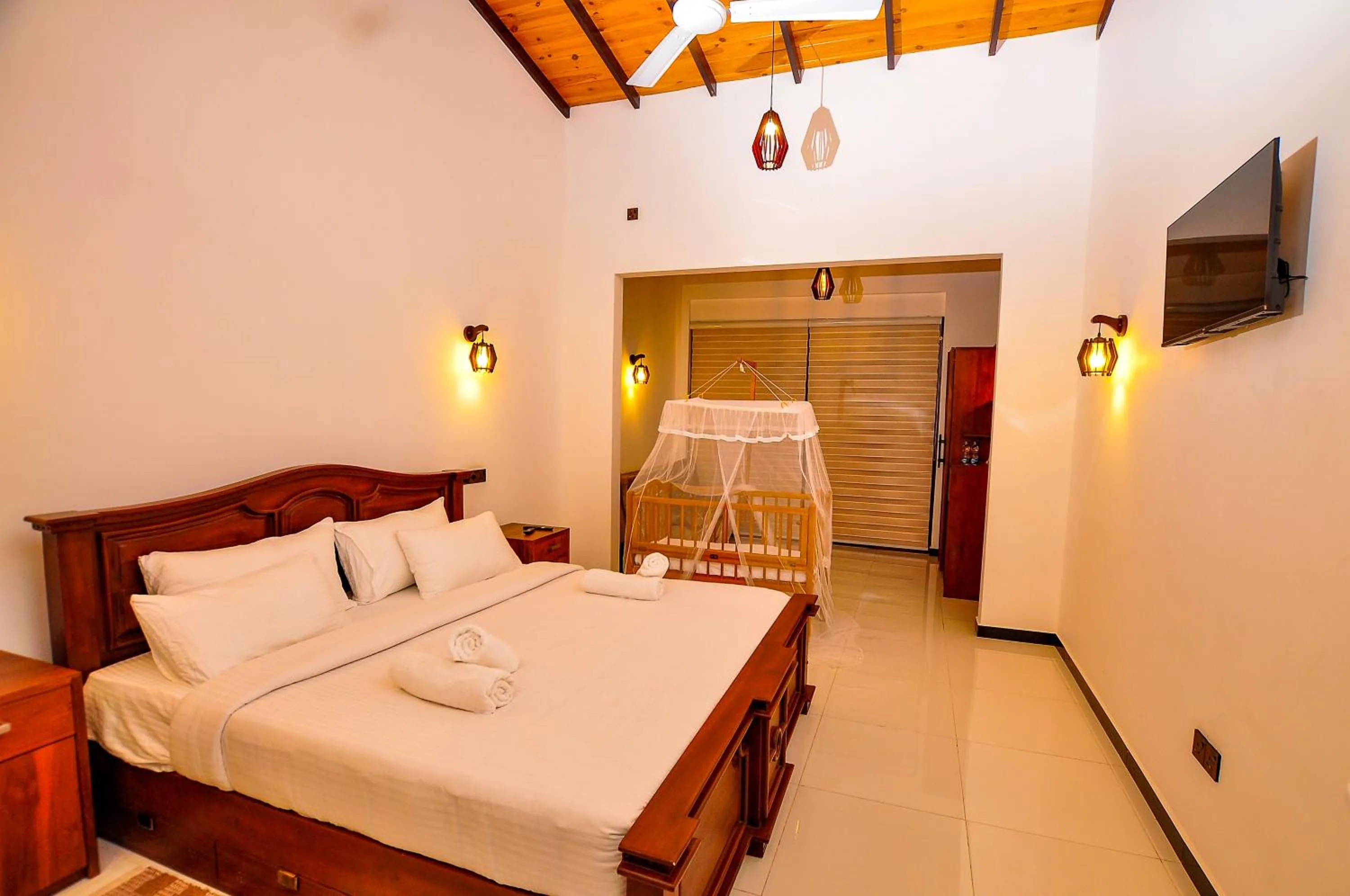 Bed in Sachinro Hotel Mirissa