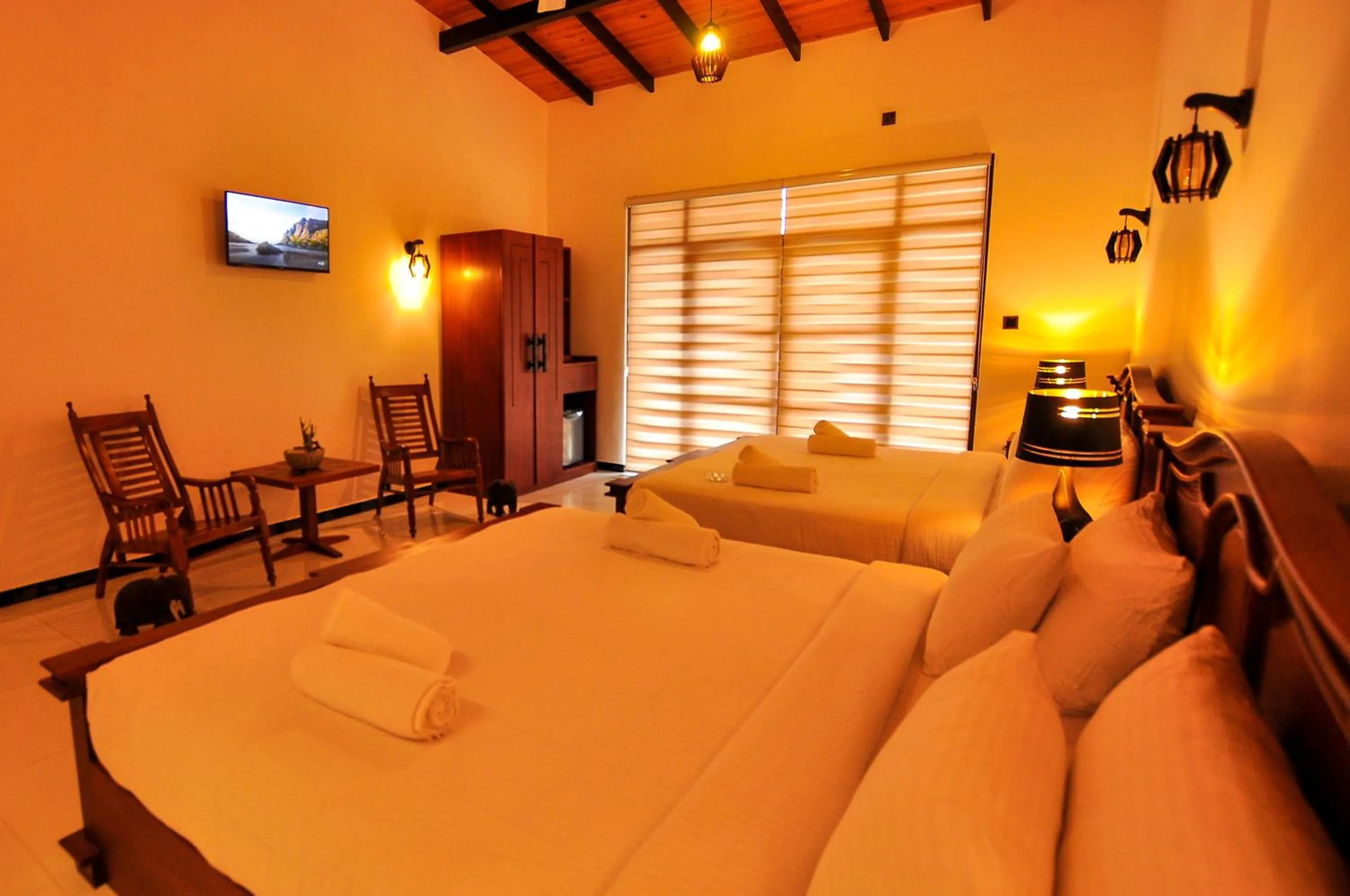 Bed in Sachinro Hotel Mirissa