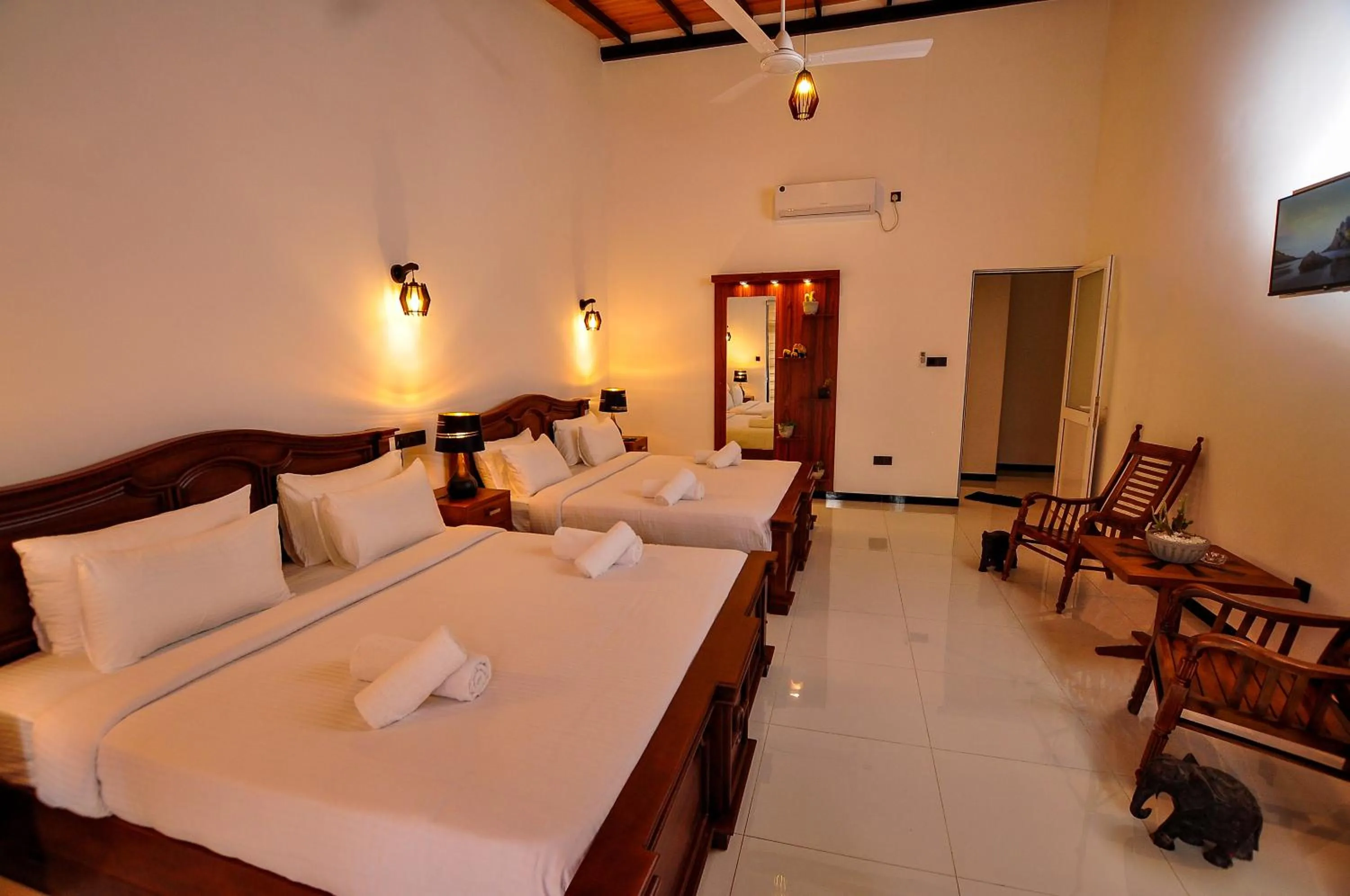 Bed in Sachinro Hotel Mirissa