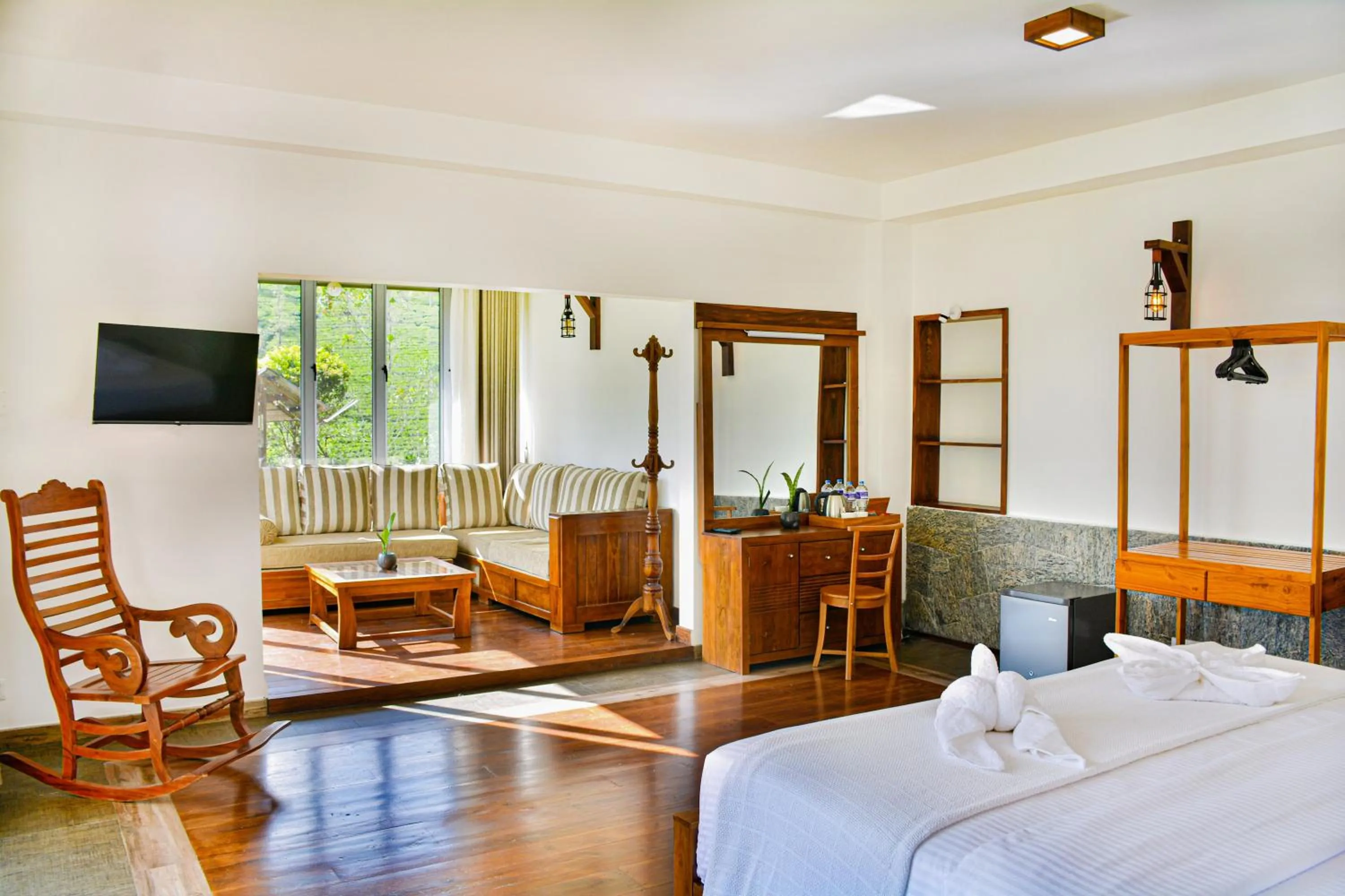 Seating area, Bed in Grand Argyle Resort