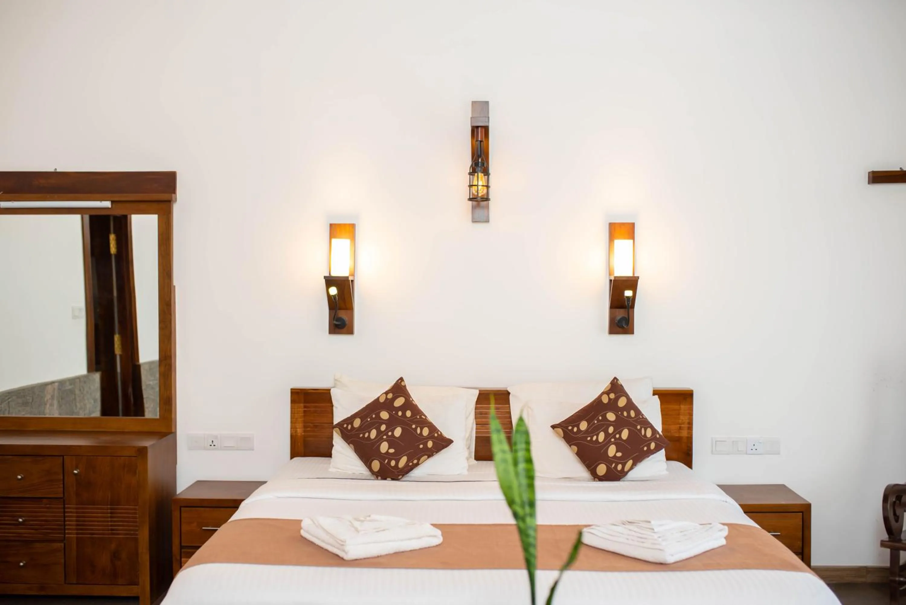 Bed in Grand Argyle Resort