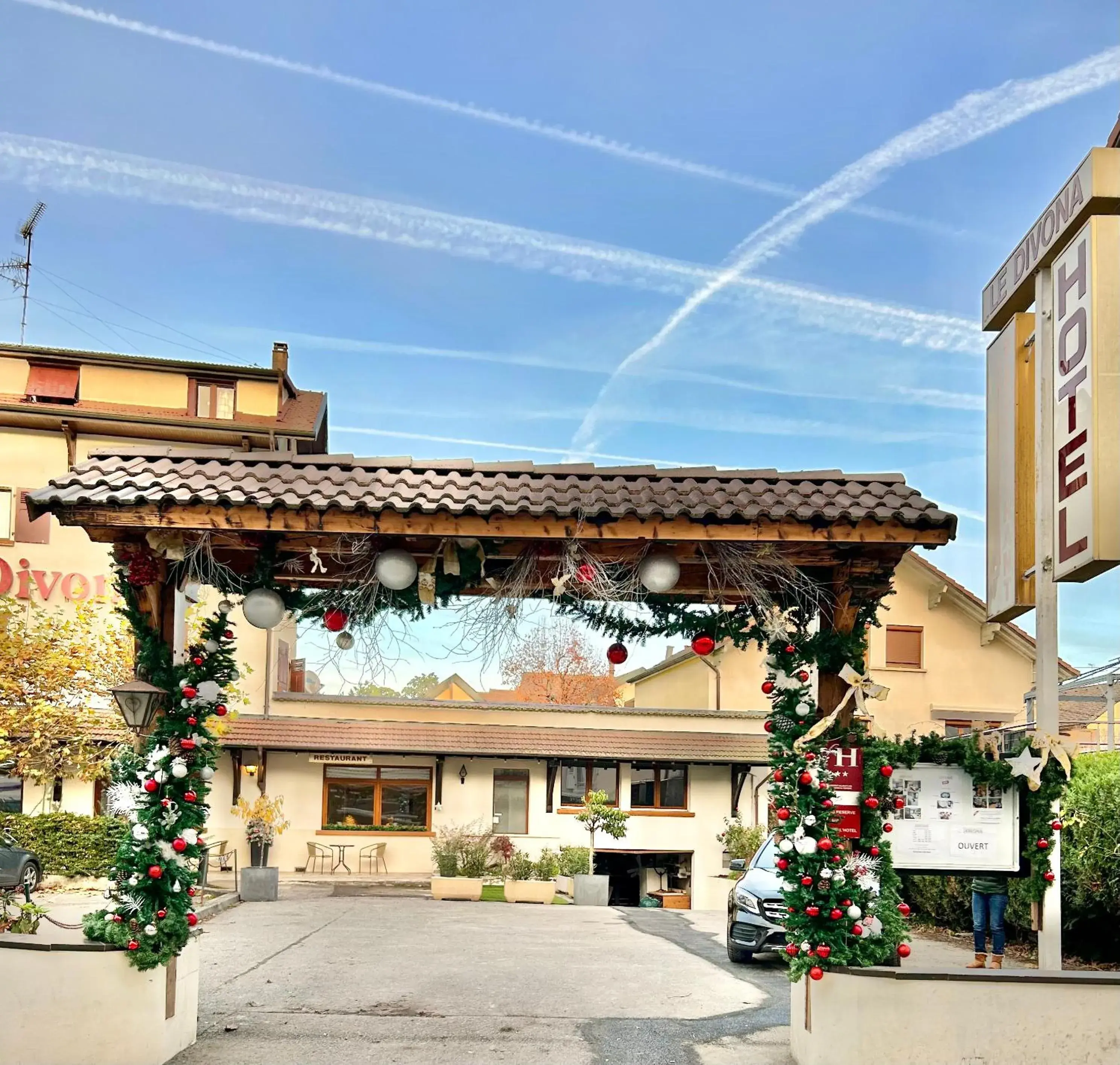 Property building in Hotel Le Divona "au coeur de Divonne" Property building in Hotel Le Divona "au coeur de Divonne"