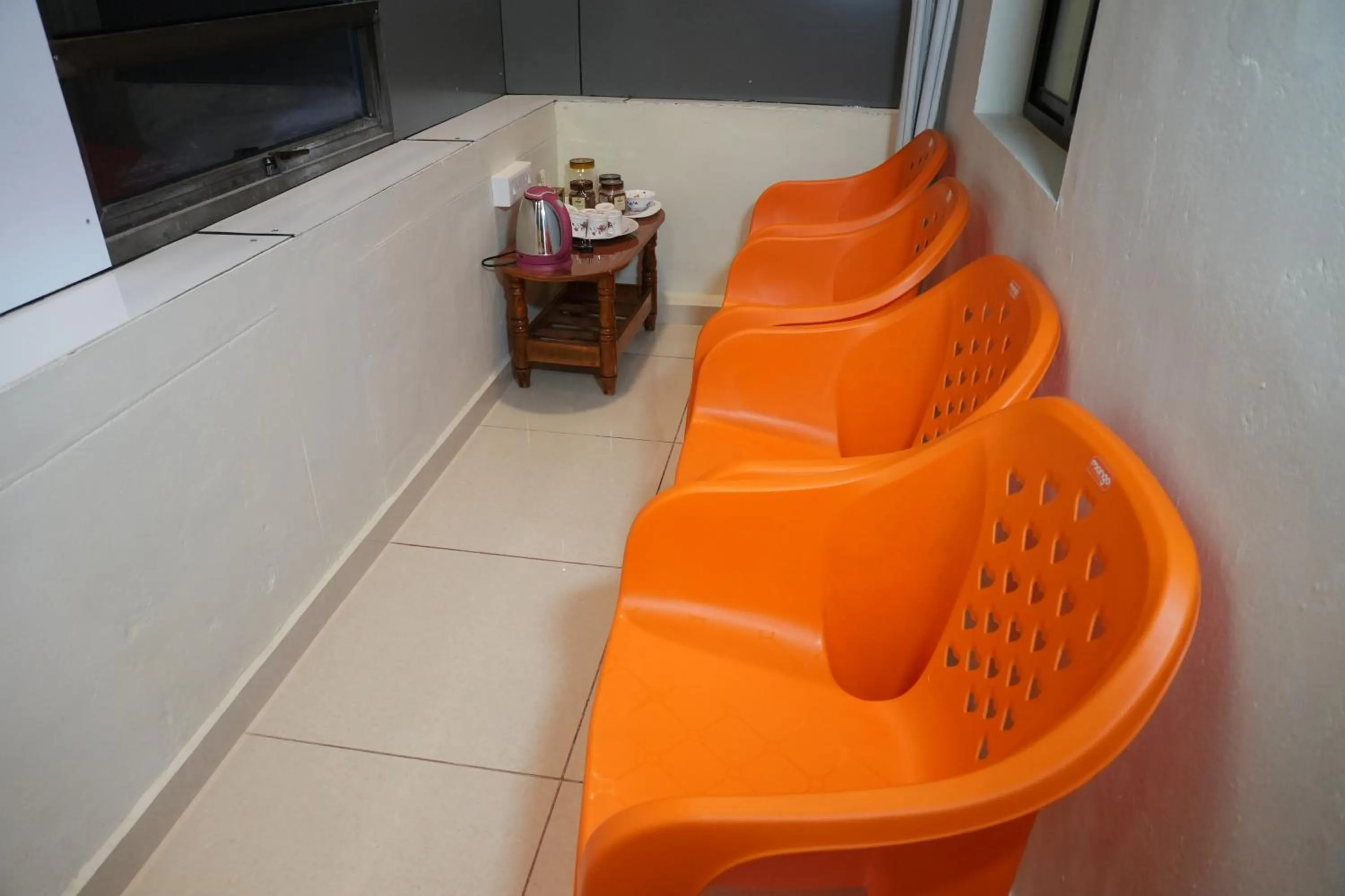 Seating area in Bay Stays near white town