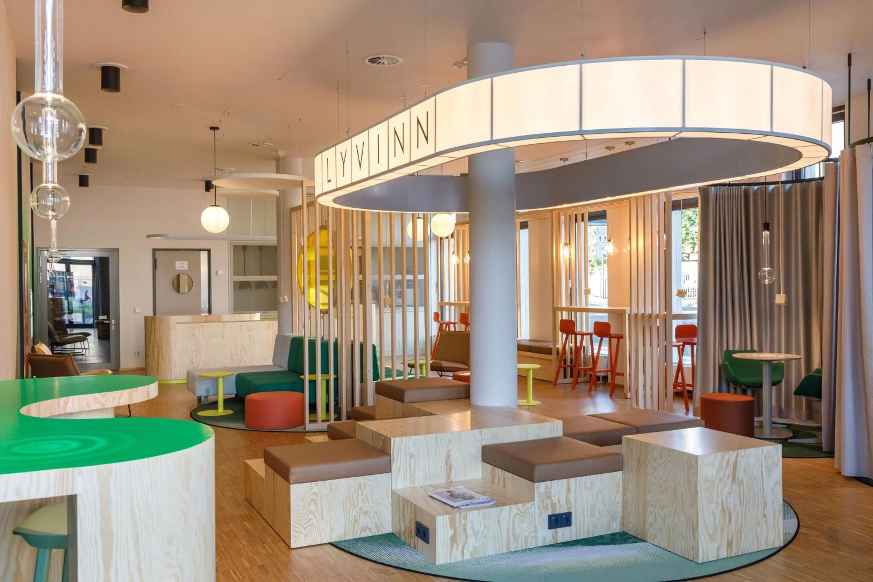 Communal lounge/ TV room in LyvInn Hotel Frankfurt