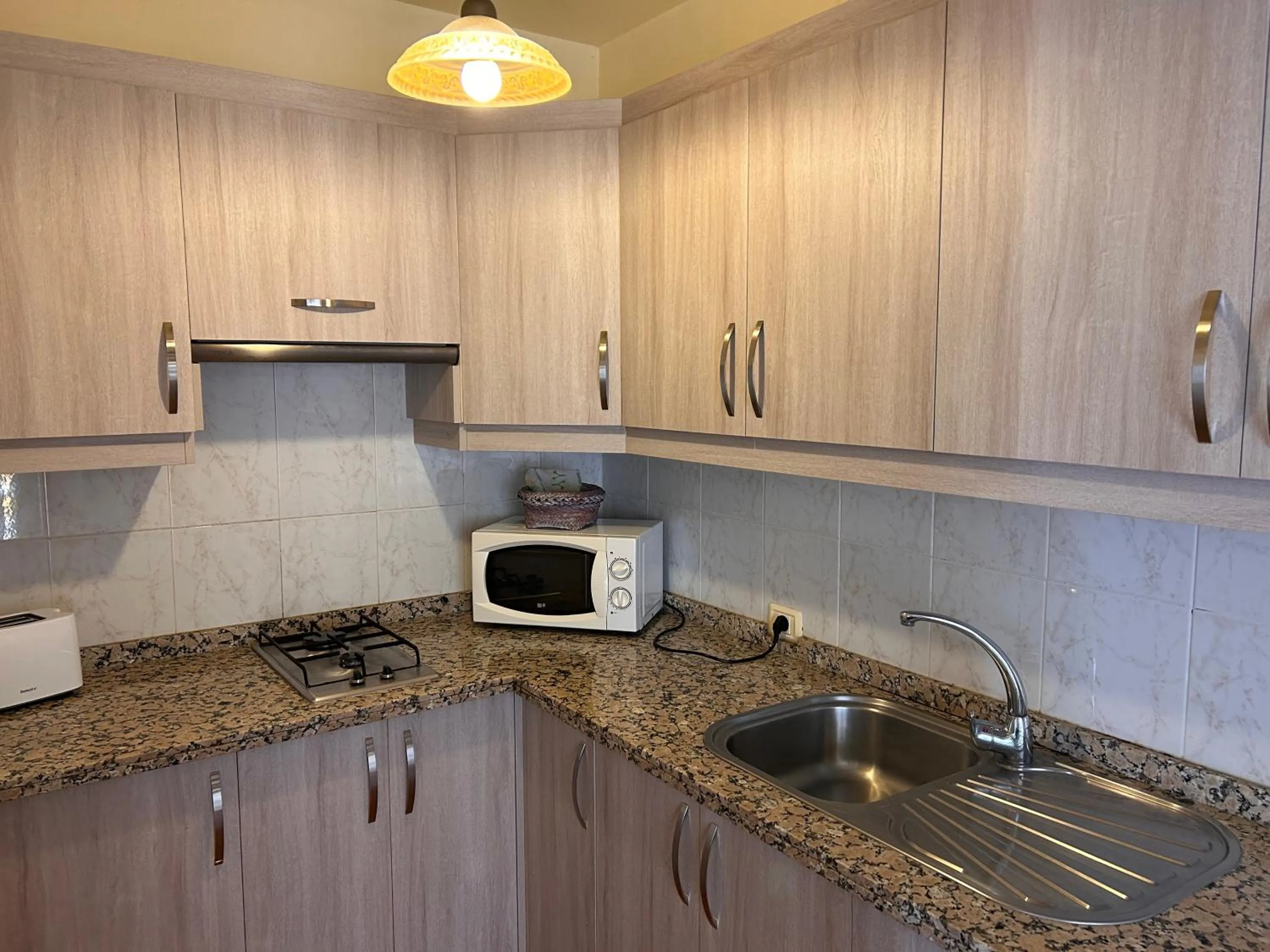 Kitchen or kitchenette in VV APARTAMENTOS ESTRELLA DEL NORTE