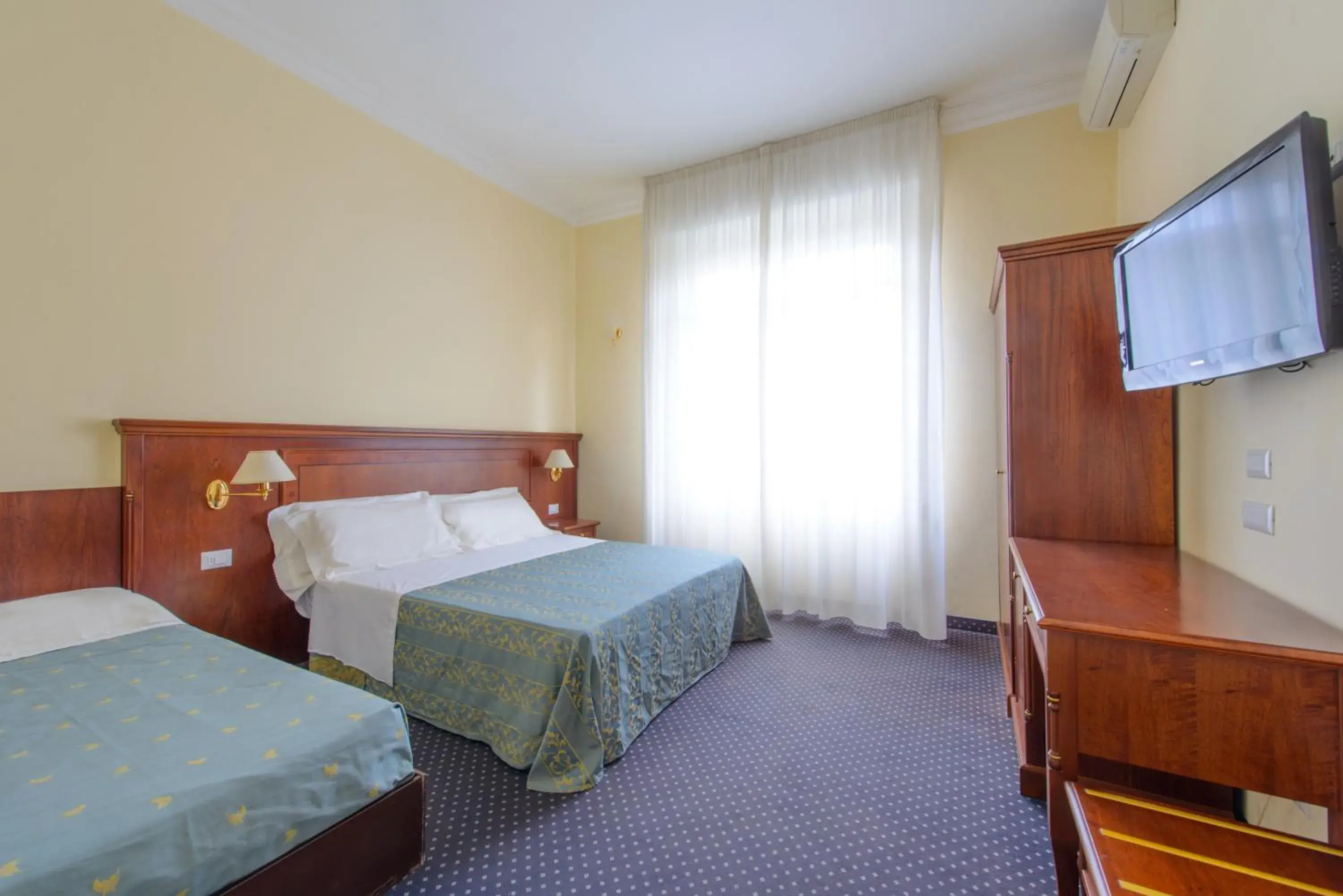 Classic Quadruple Room in Palace Hotel Domus Mea Riccione Classic Quadruple Room in Palace Hotel Domus Mea Riccione