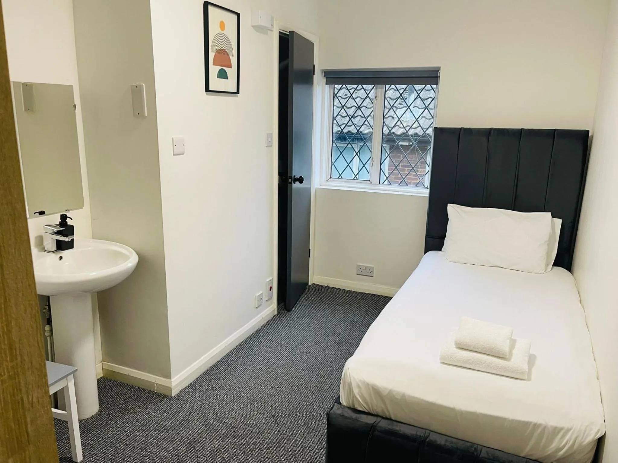 Bedroom, Bed in Woodford Hotel