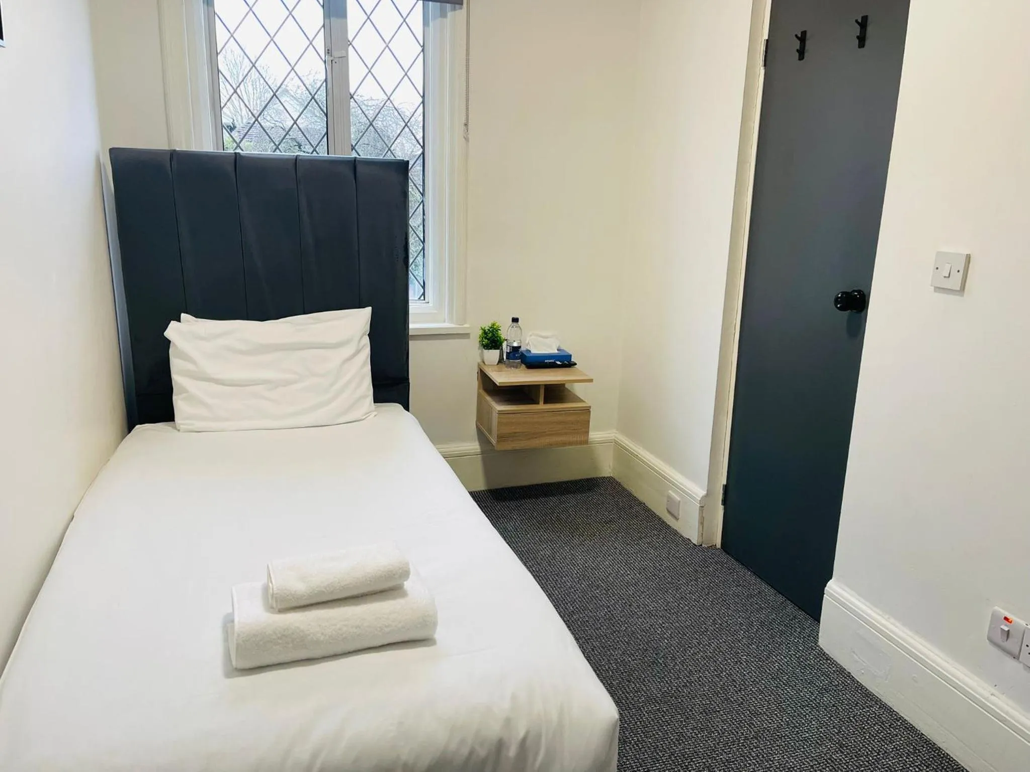 Bedroom, Bed in Woodford Hotel