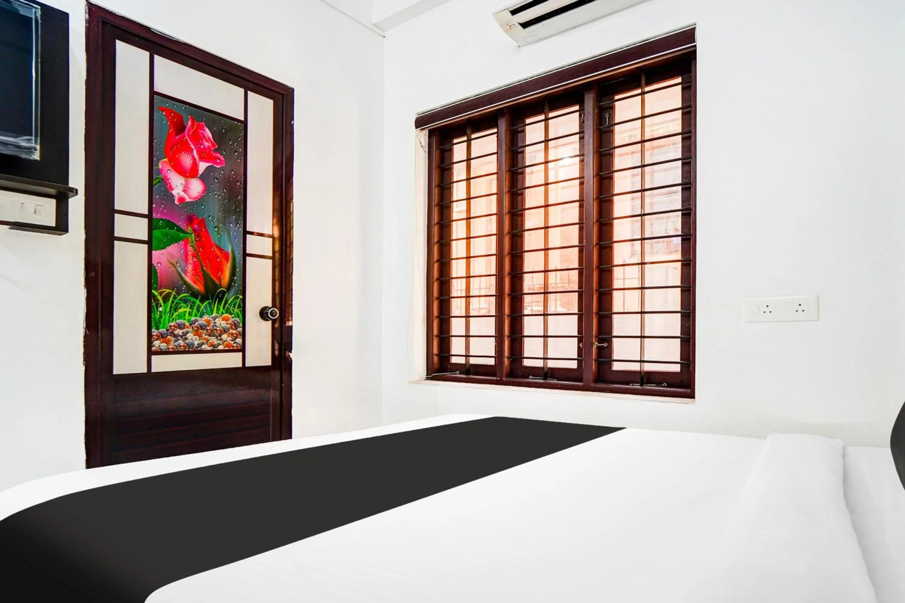 Bedroom, Bed in Hotel O Attukal Near Attakulangara Formerly Remya Residency