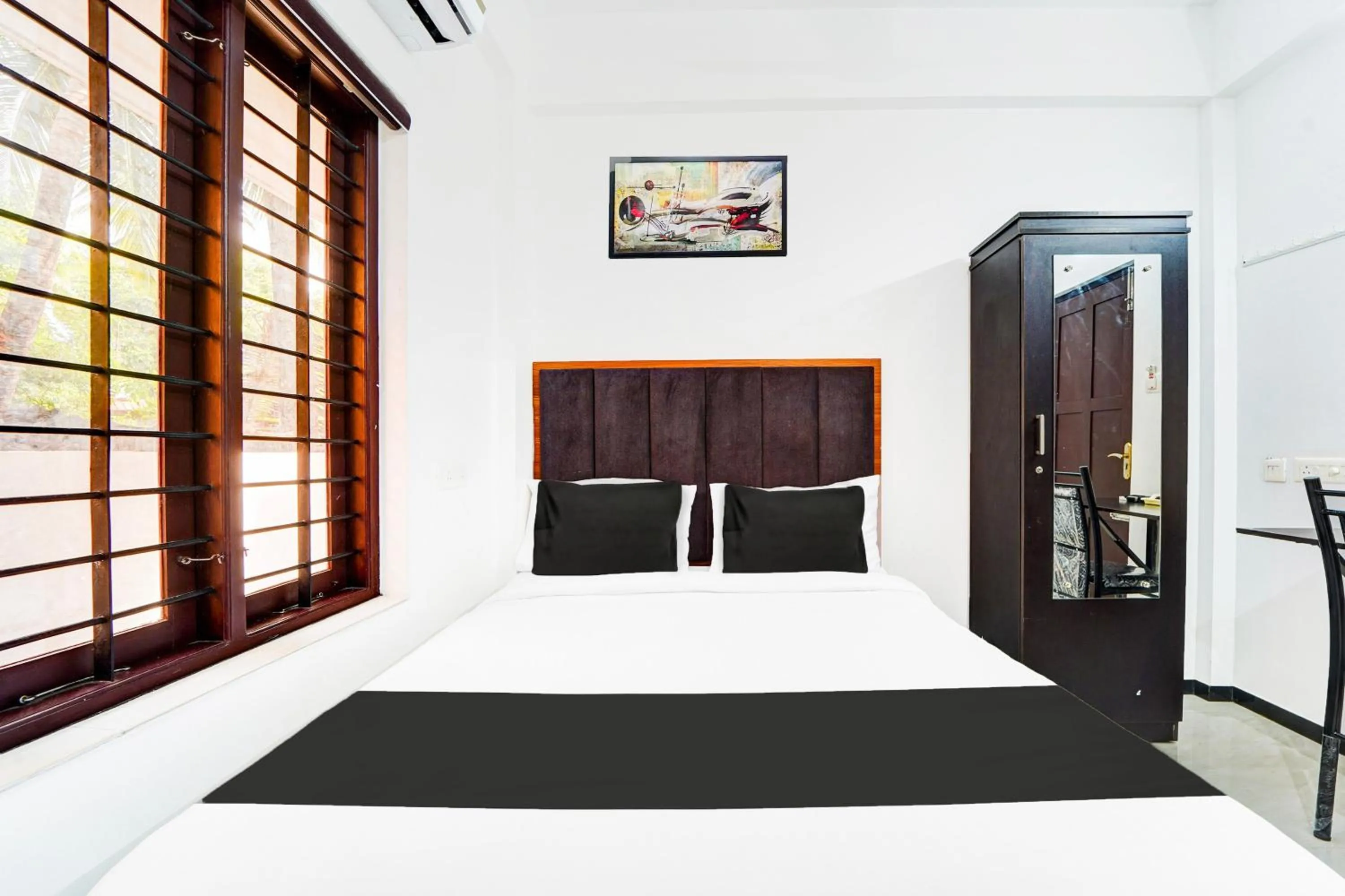 Bedroom, Bed in Hotel O Attukal Near Attakulangara Formerly Remya Residency