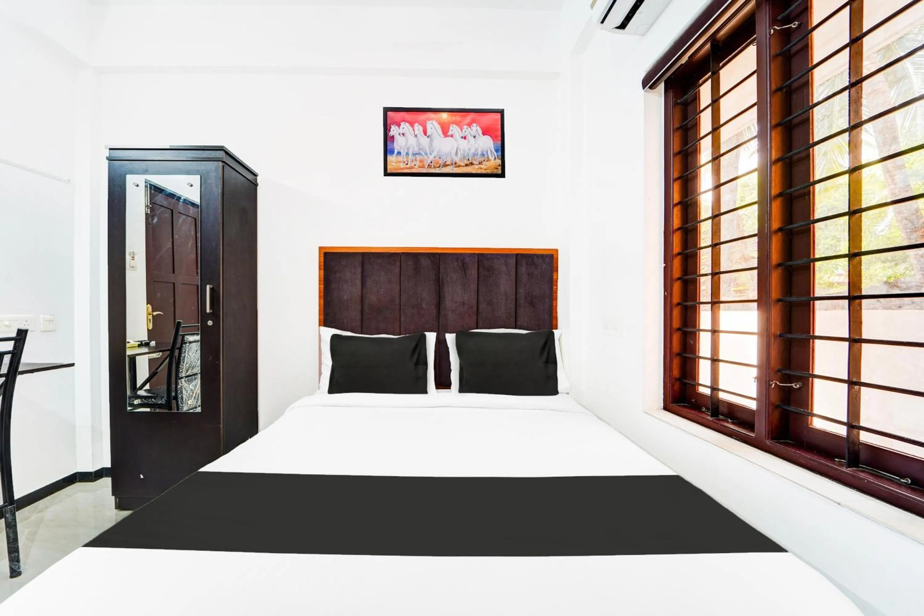 Bedroom, Bed in Hotel O Attukal Near Attakulangara Formerly Remya Residency