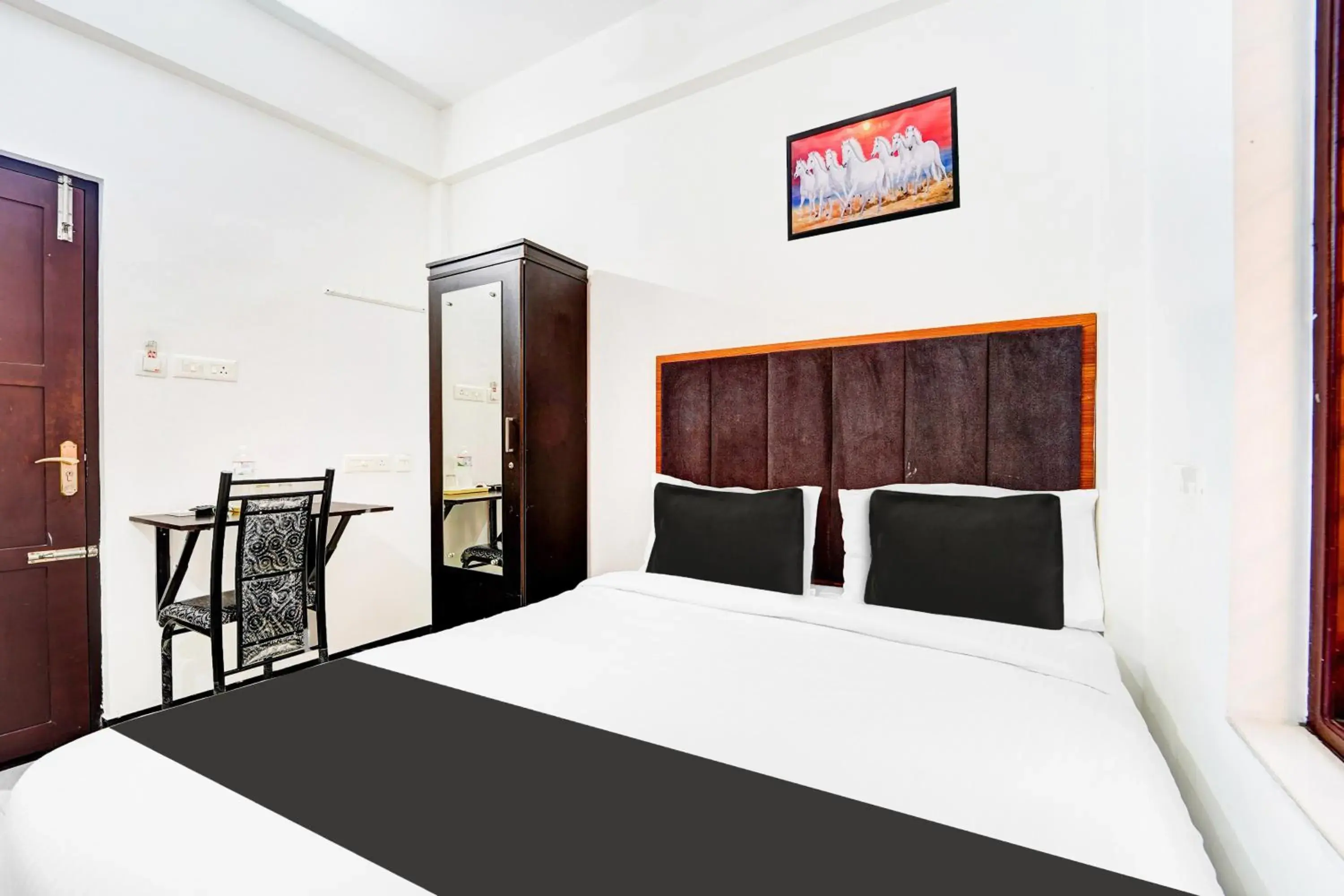 Bedroom, Bed in Hotel O Attukal Near Attakulangara Formerly Remya Residency Bedroom, Bed in Hotel O Attukal Near Attakulangara Formerly Remya Residency