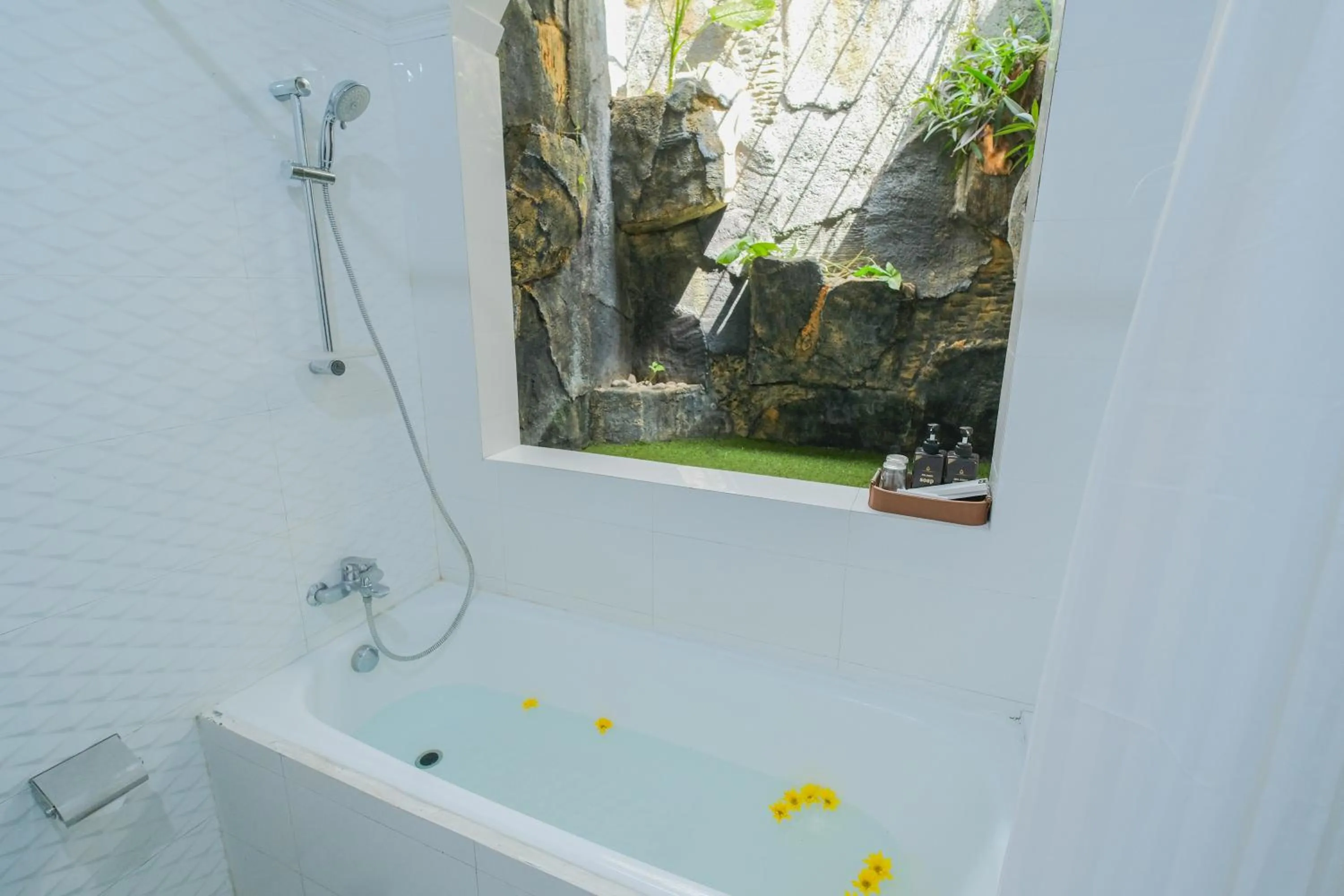 Bathroom in Royal Brongto Hotel