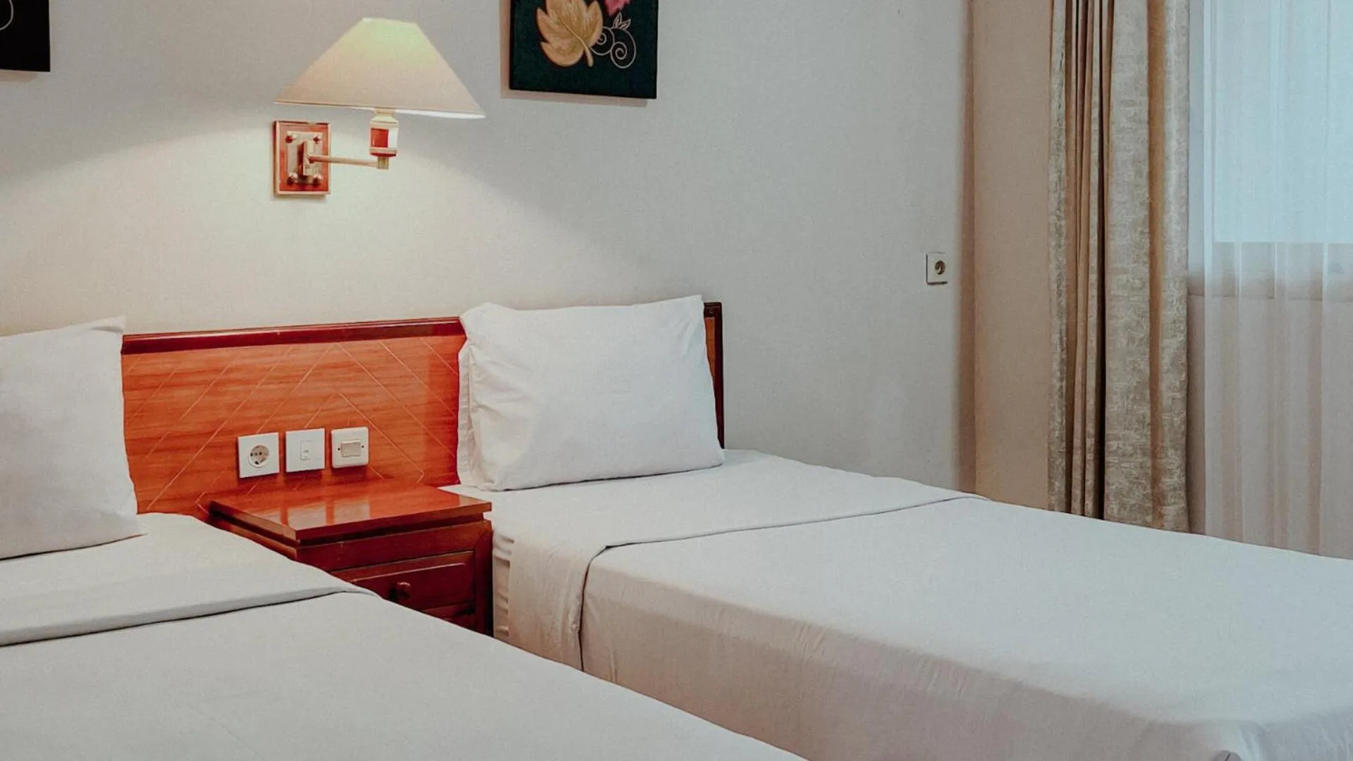 Bed in Royal Brongto Hotel