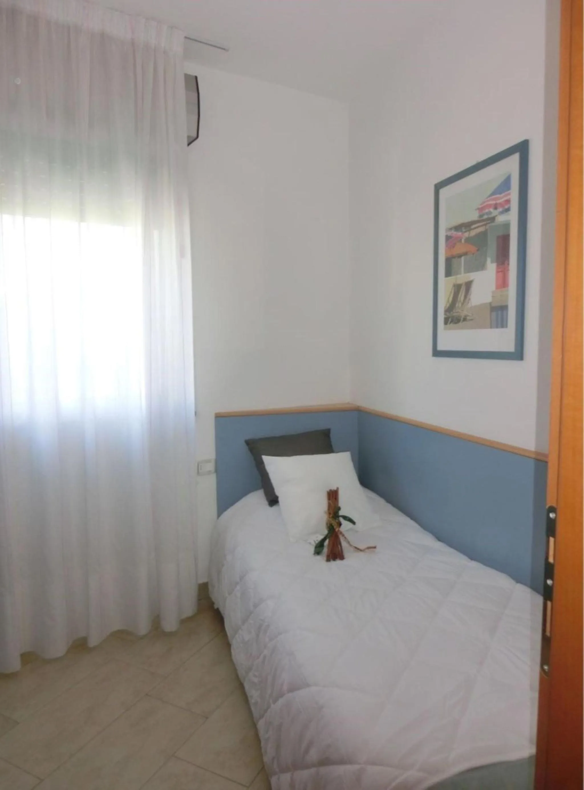 Bed in Cozy apartment 200mt from the beach