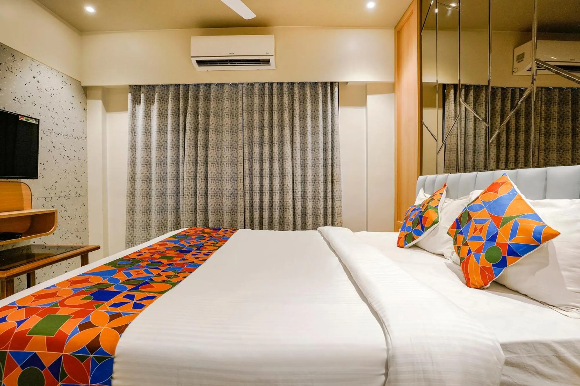 Bed in FabHotel Springs Lodging