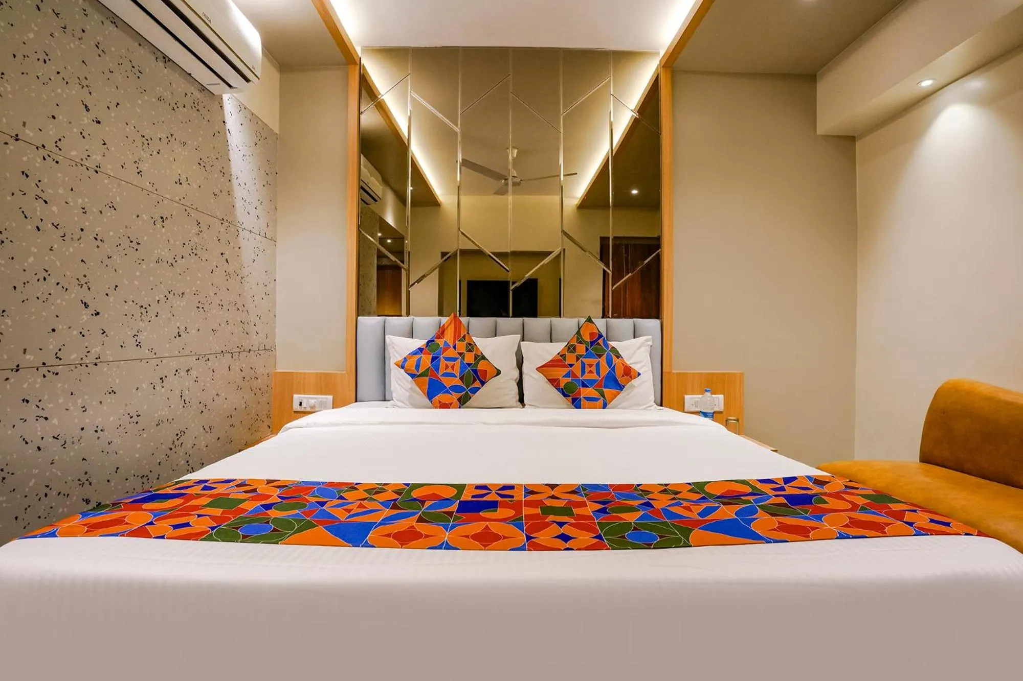 Bed in FabHotel Springs Lodging