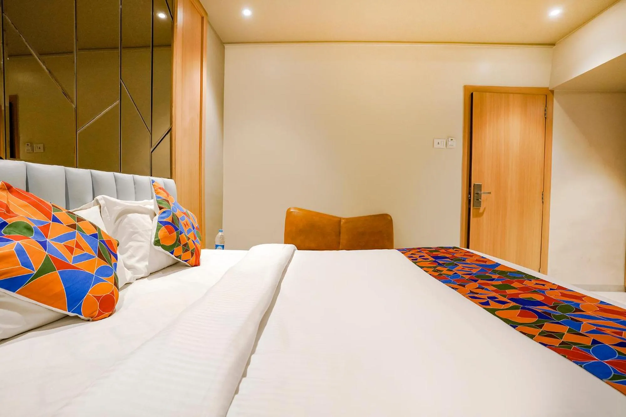 Bed in FabHotel Springs Lodging