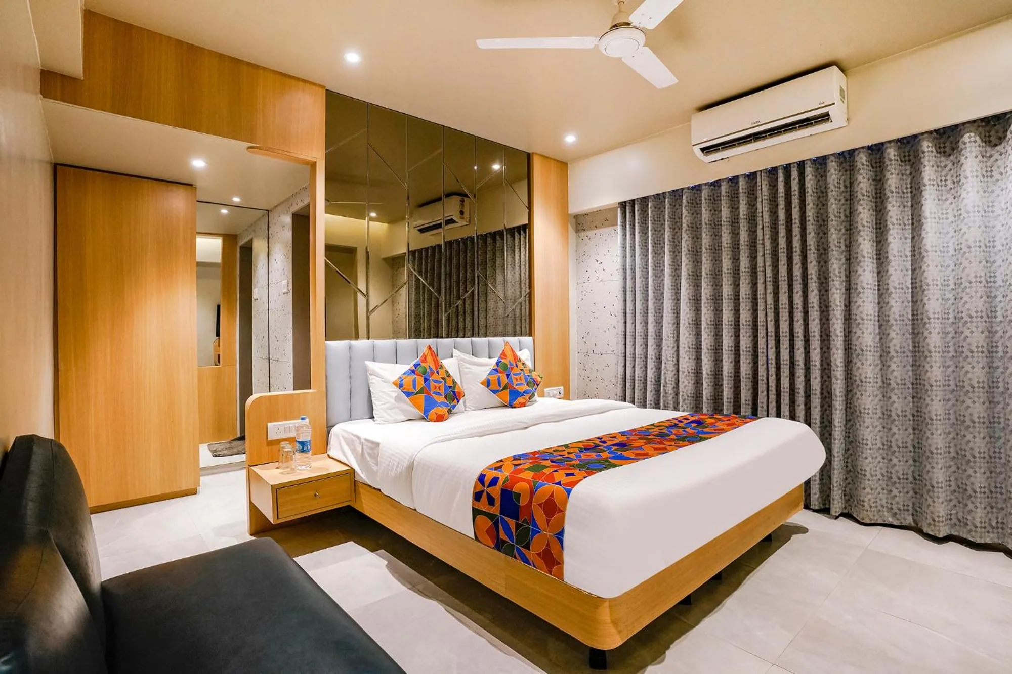 Bed in FabHotel Springs Lodging