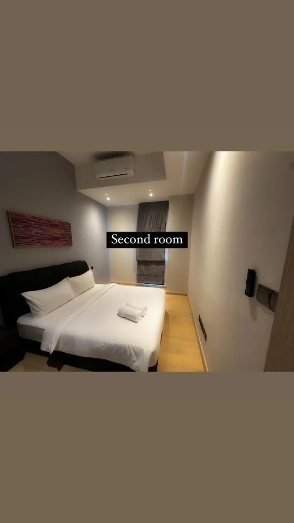 Bedroom, Bed in AXQUISITE SUITES at KLCC