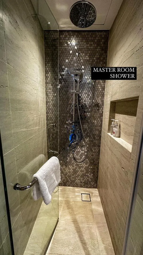 Shower in AXQUISITE SUITES at KLCC