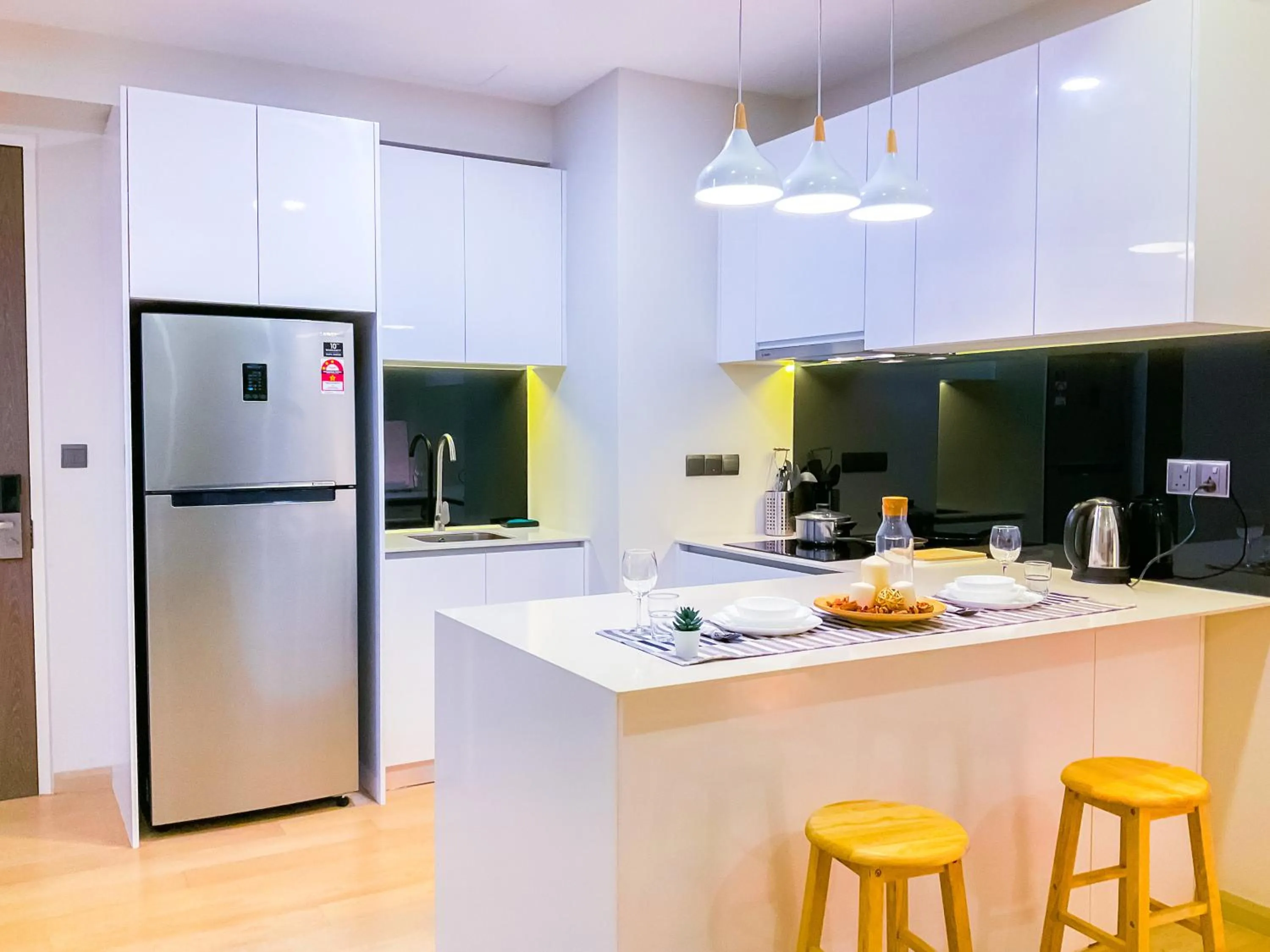 Kitchen or kitchenette in AXQUISITE SUITES at KLCC