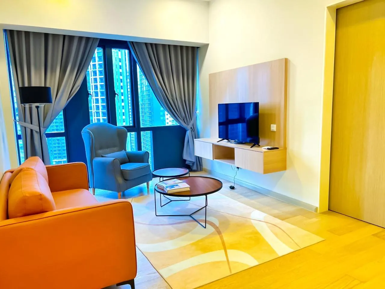 Communal lounge/ TV room in AXQUISITE SUITES at KLCC