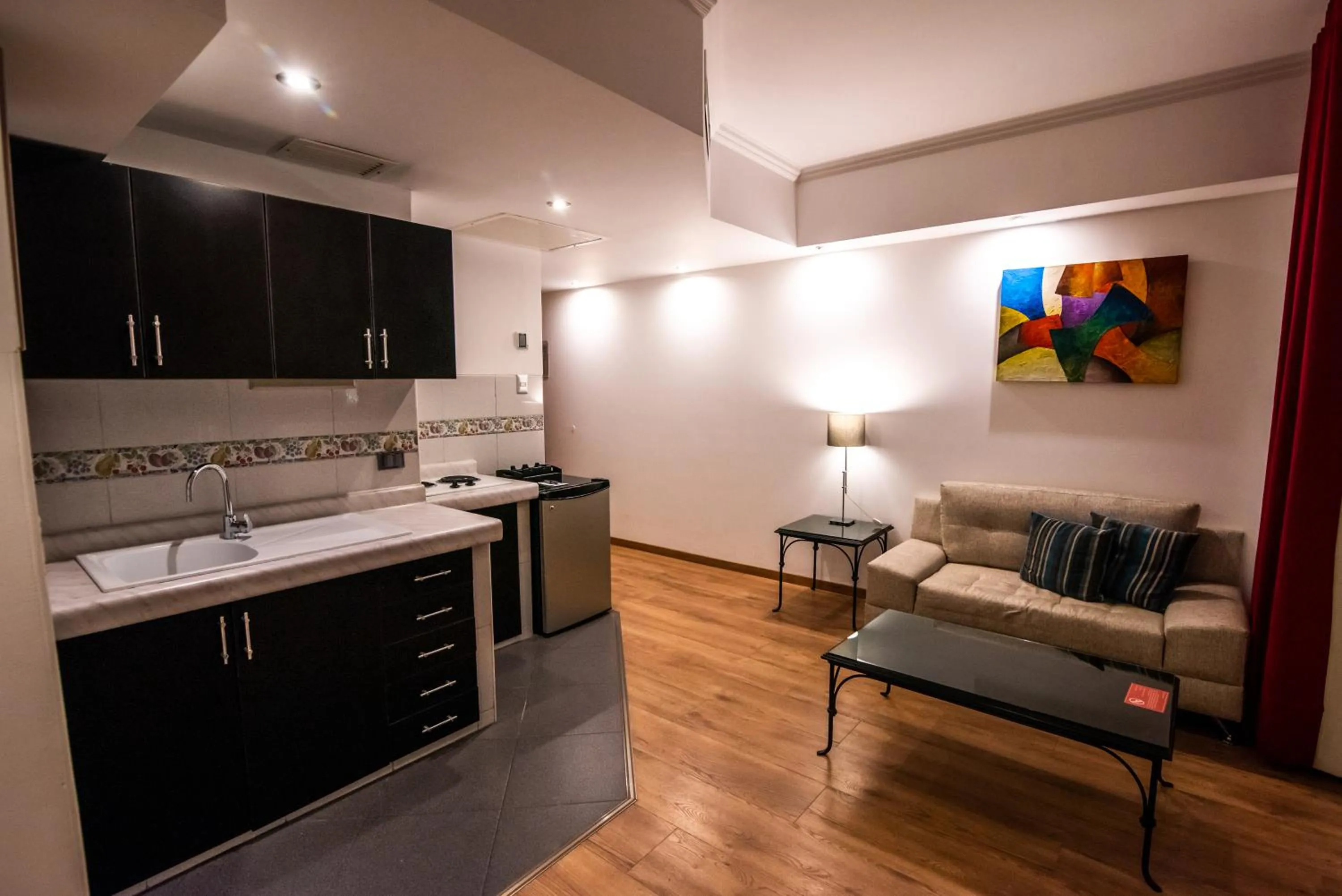 Kitchen or kitchenette in El Polo Hotel & Suites