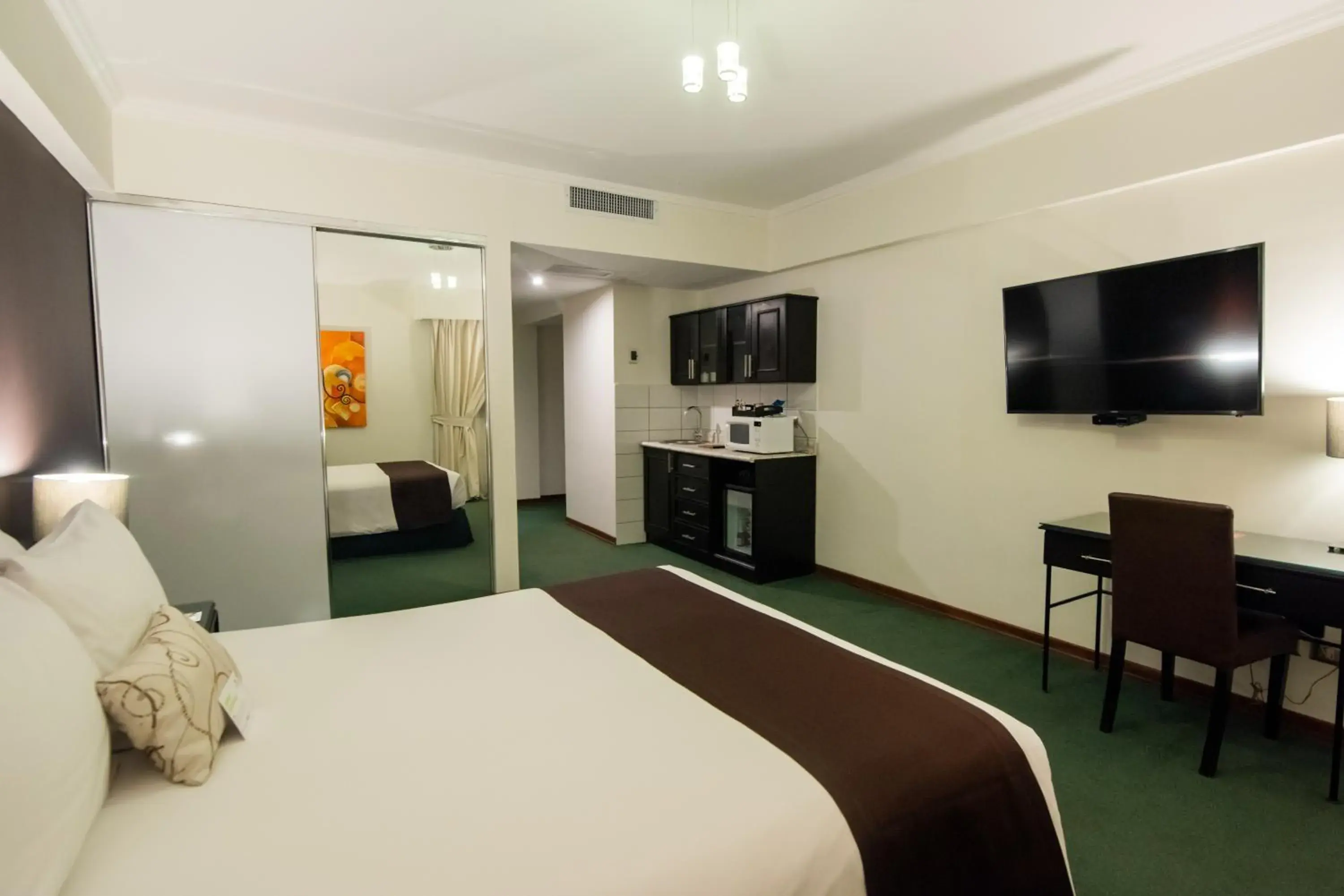 Photo of the whole room, Bed in El Polo Hotel & Suites Photo of the whole room, Bed in El Polo Hotel & Suites