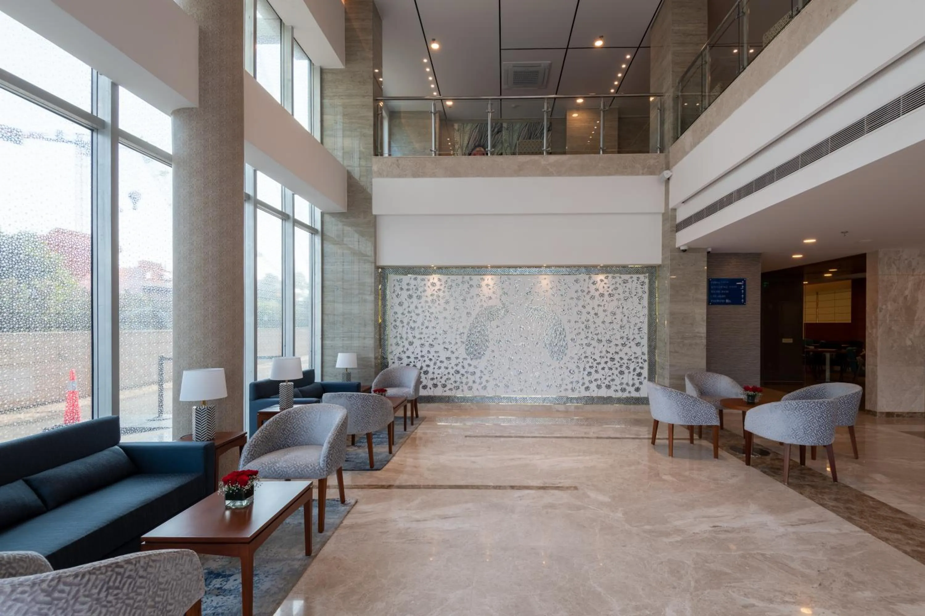 Seating area in ExpoInn Suites and Convention