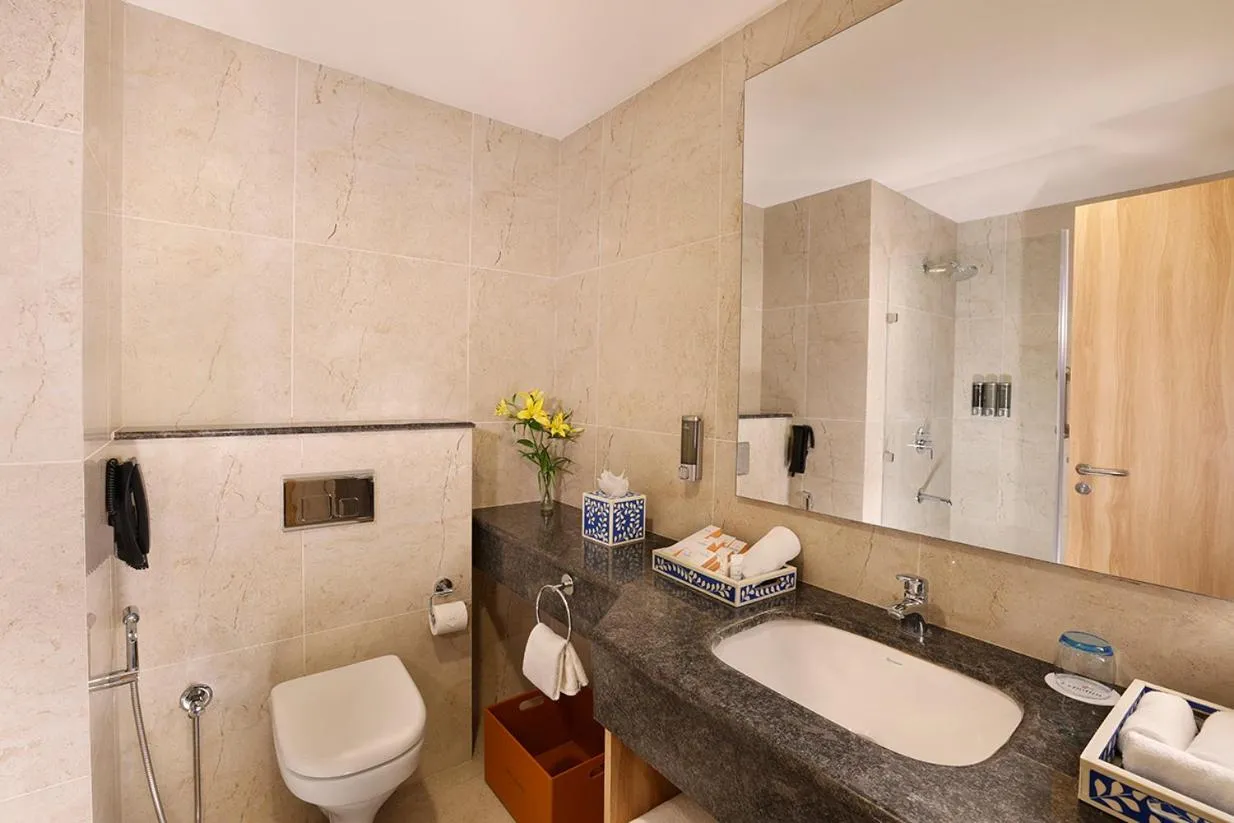 Bathroom in ExpoInn Suites and Convention