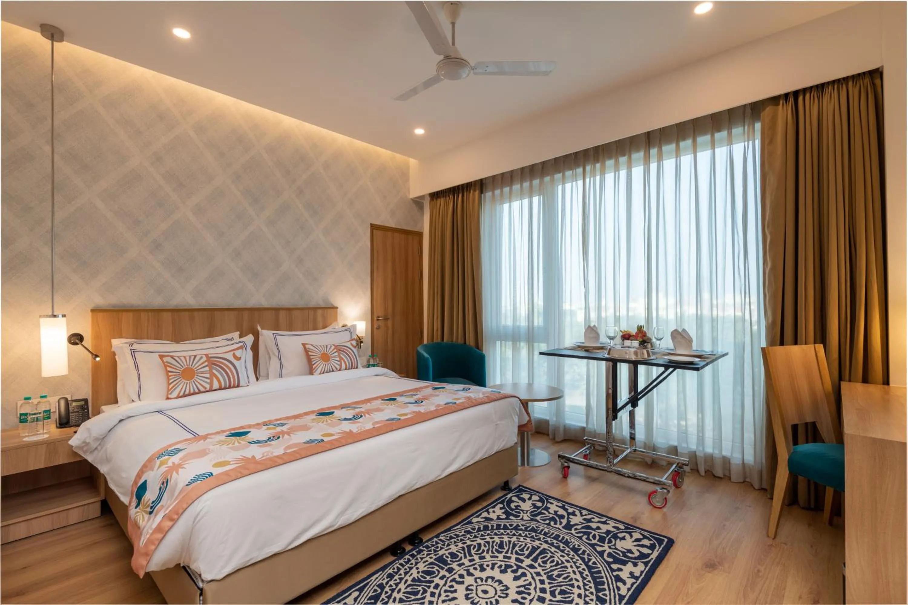 Bed in ExpoInn Suites and Convention