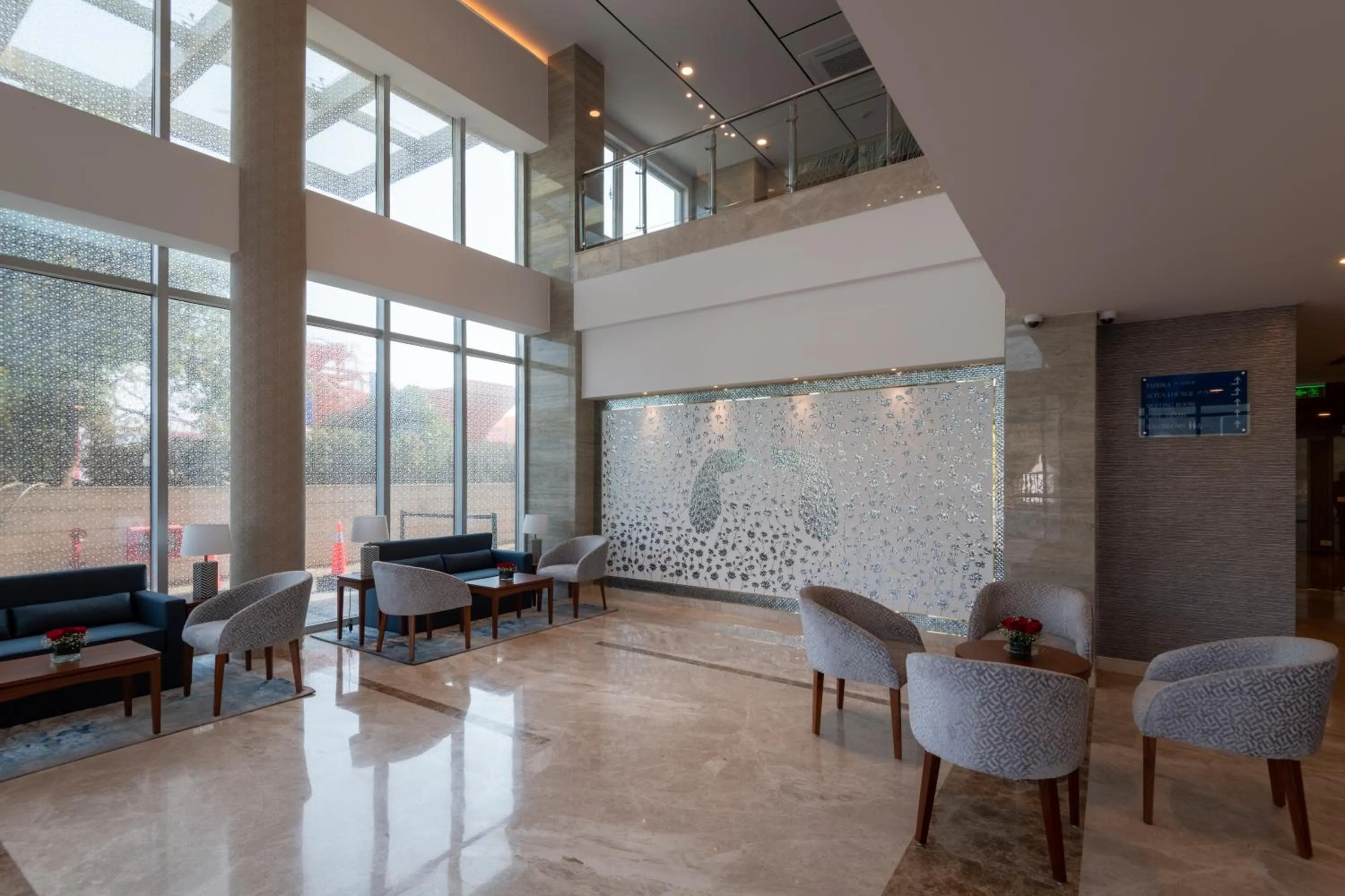 Seating area in ExpoInn Suites and Convention