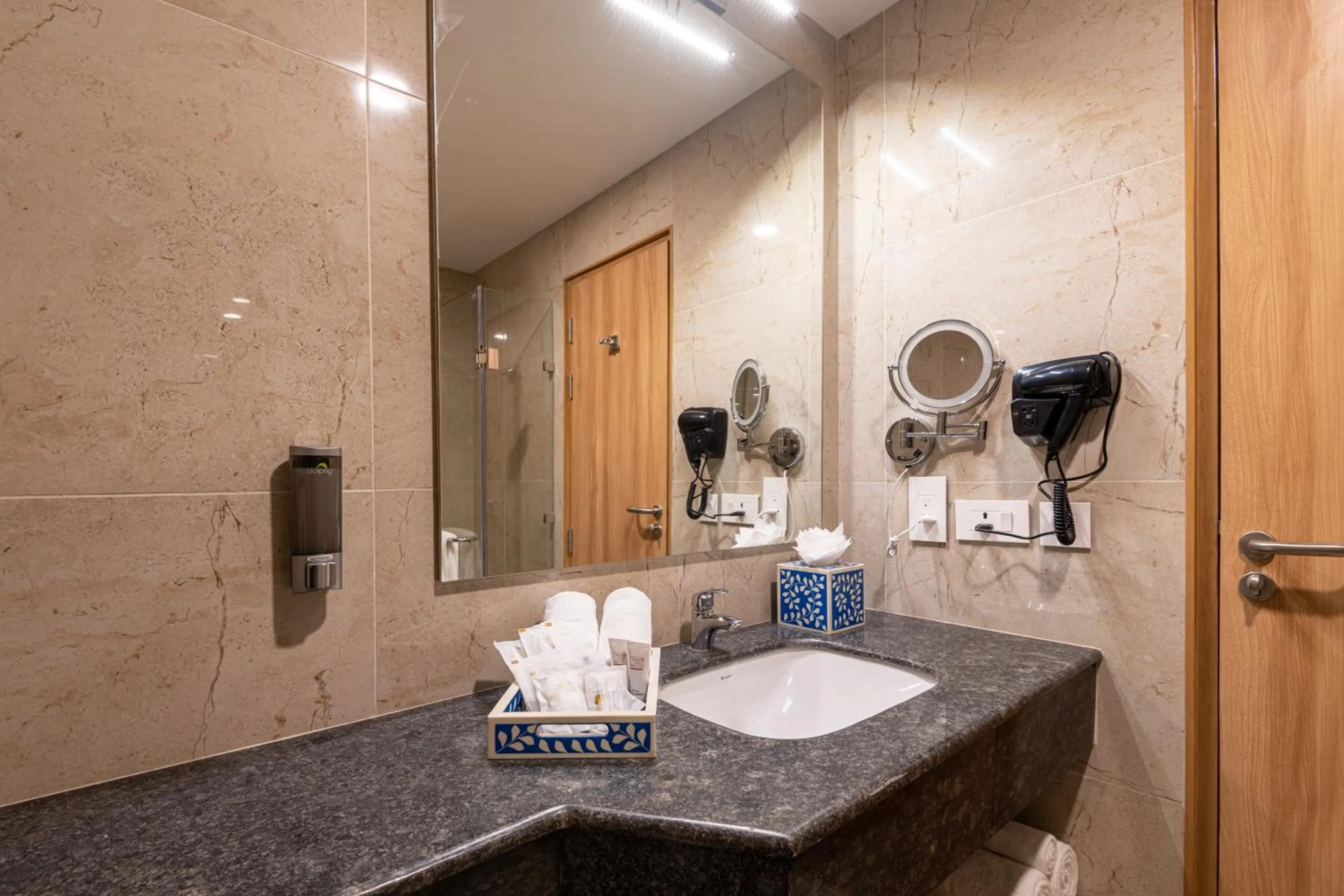 Bathroom in ExpoInn Suites and Convention