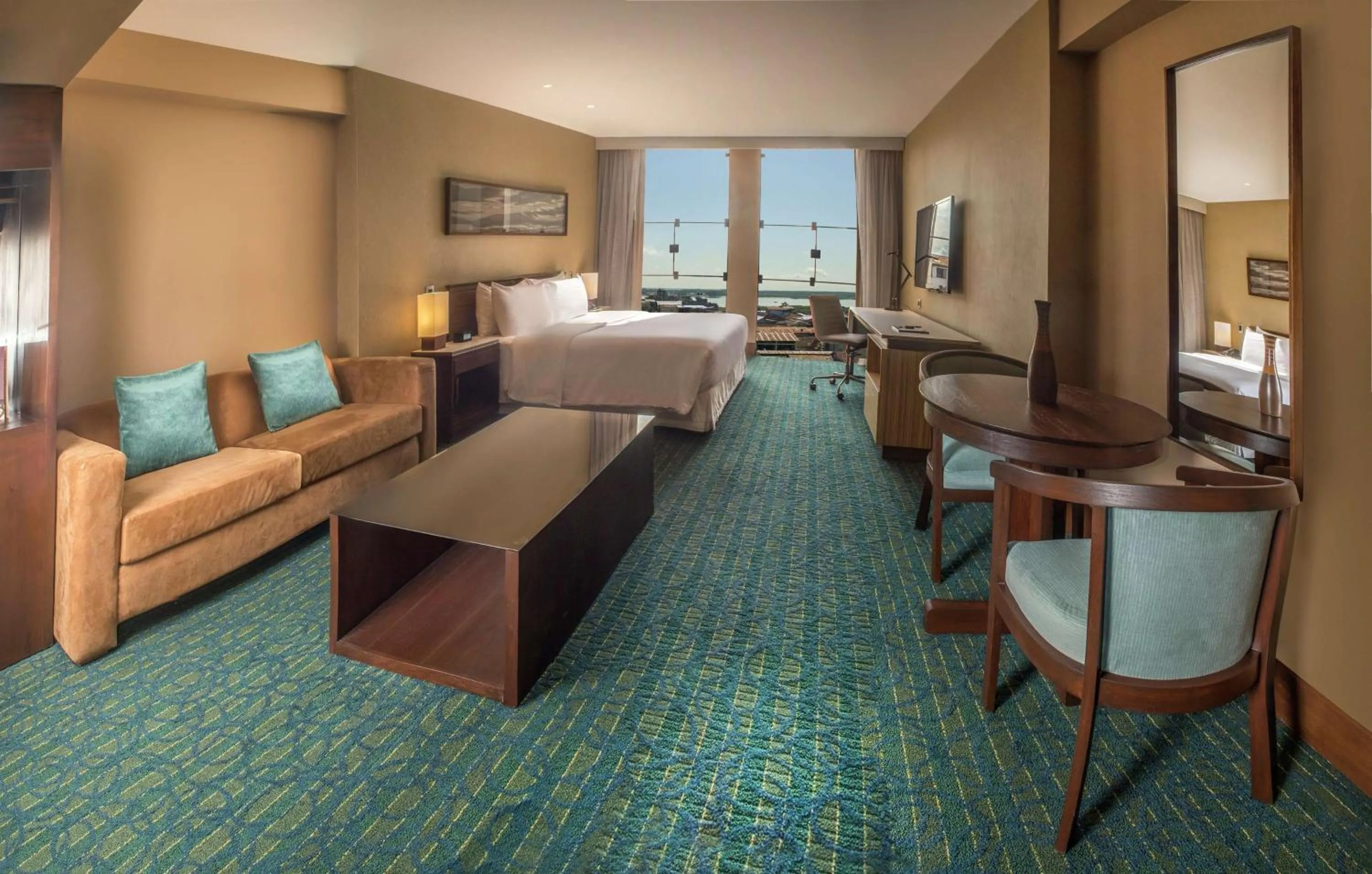 Living room, Bed in Doubletree By Hilton Iquitos