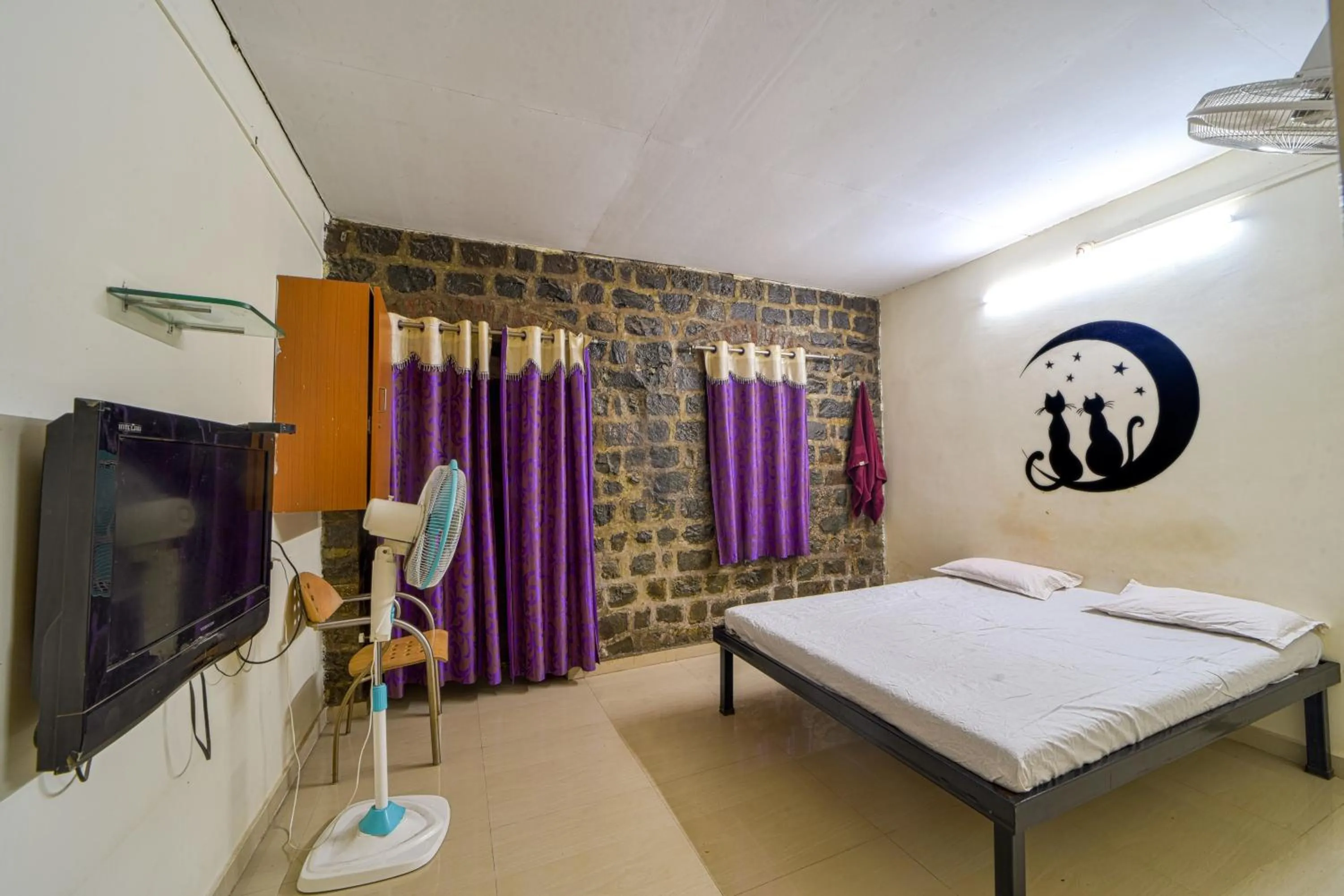 Bedroom in Hotel Rukmini, kolhapur