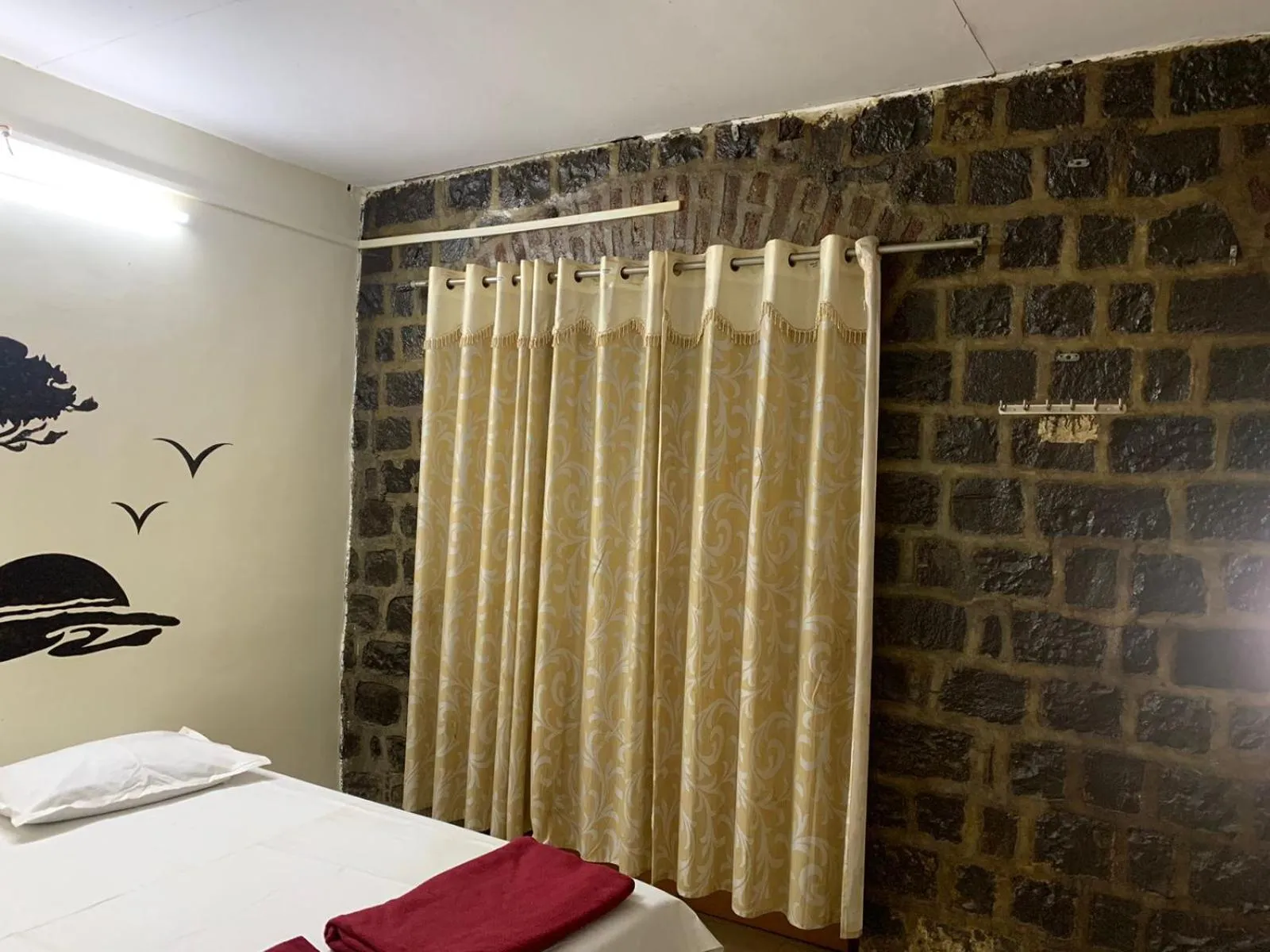 Bedroom in Hotel Rukmini, kolhapur