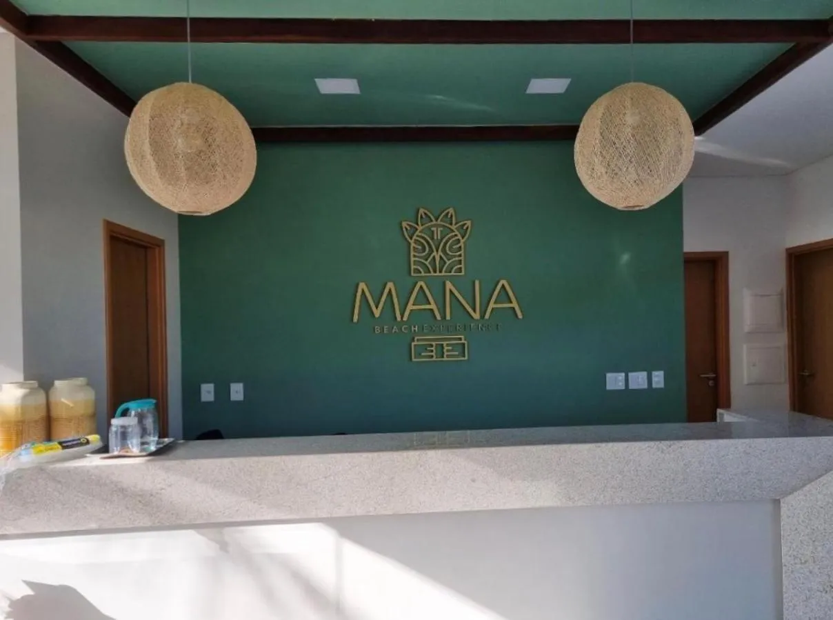 Property logo or sign in Porto Beach Resort - Mana Beach Experience