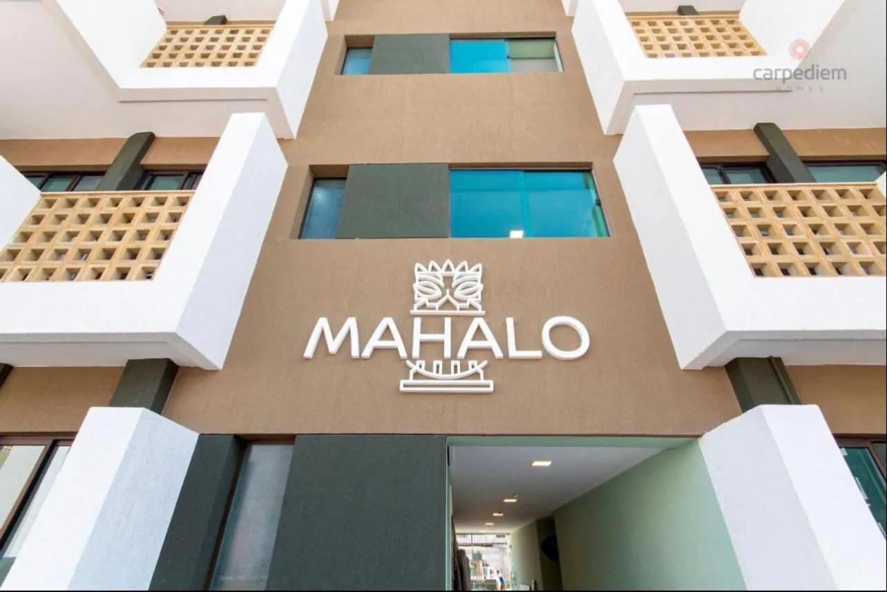 Property logo or sign in Porto Beach Resort - Mana Beach Experience