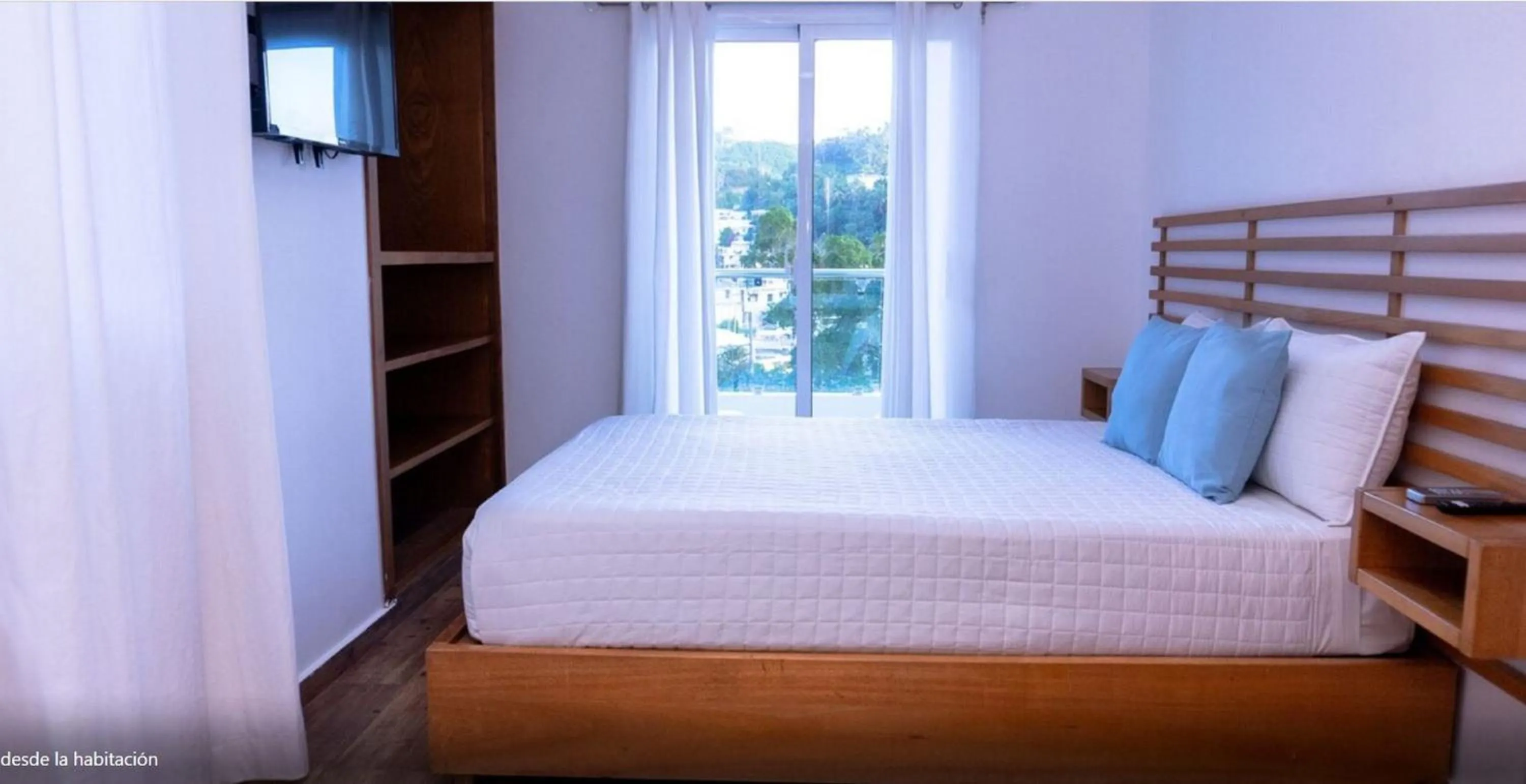 Bed in Samaná Suites Hotel by Habita