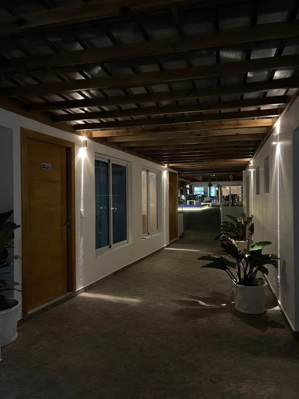 Property building in Samaná Suites Hotel by Habita