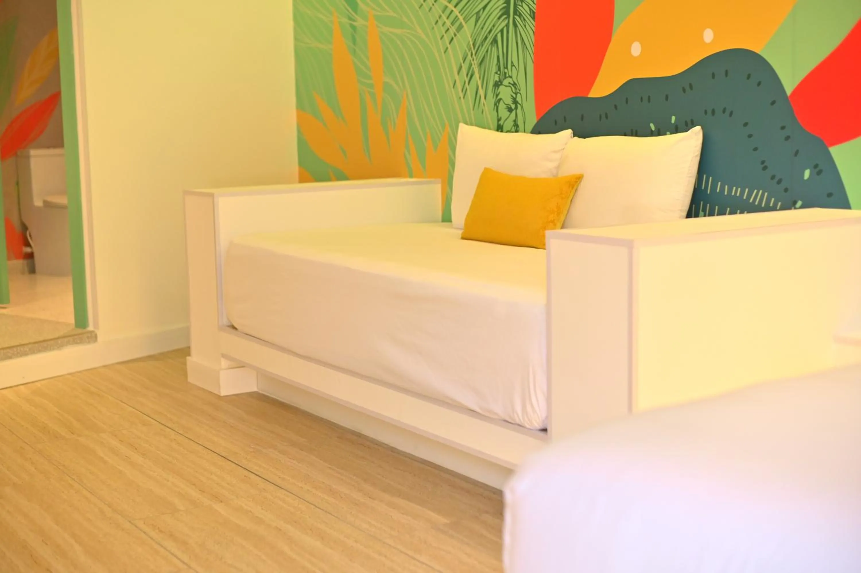 Living room, Bed in Hotel Nomadic Design