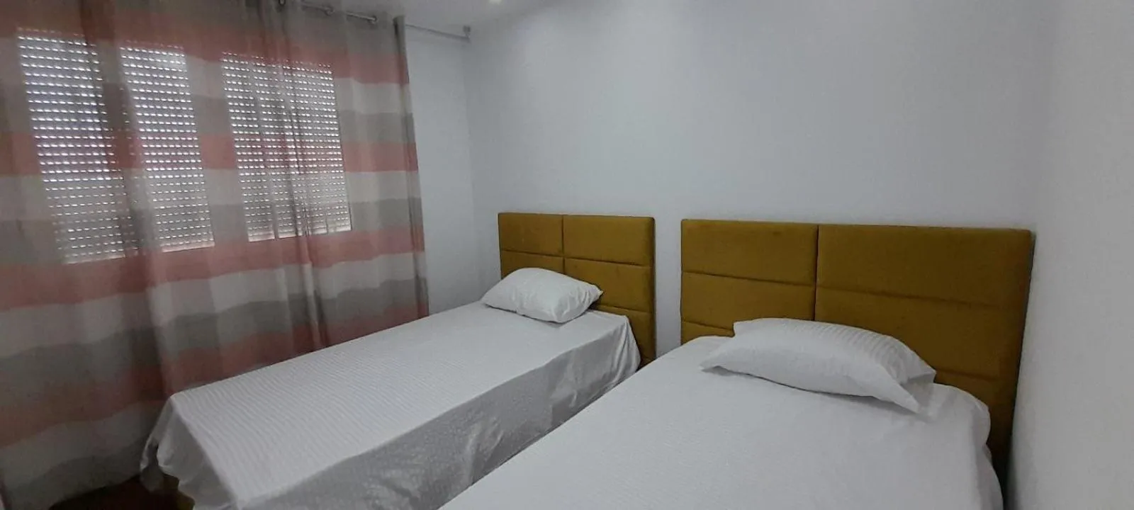 Bedroom, Bed in Dodona ApartHotel in Prishtina