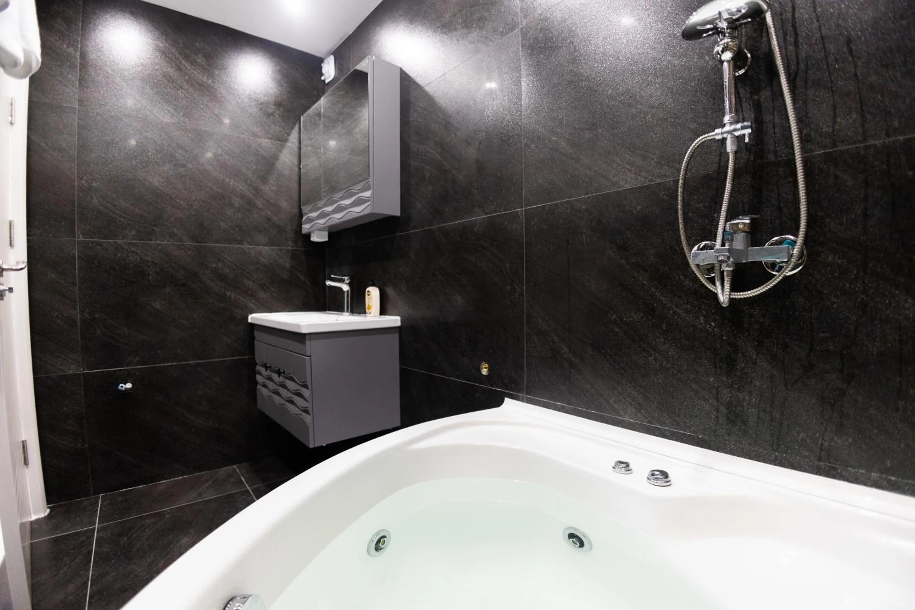Shower in Dodona ApartHotel in Prishtina