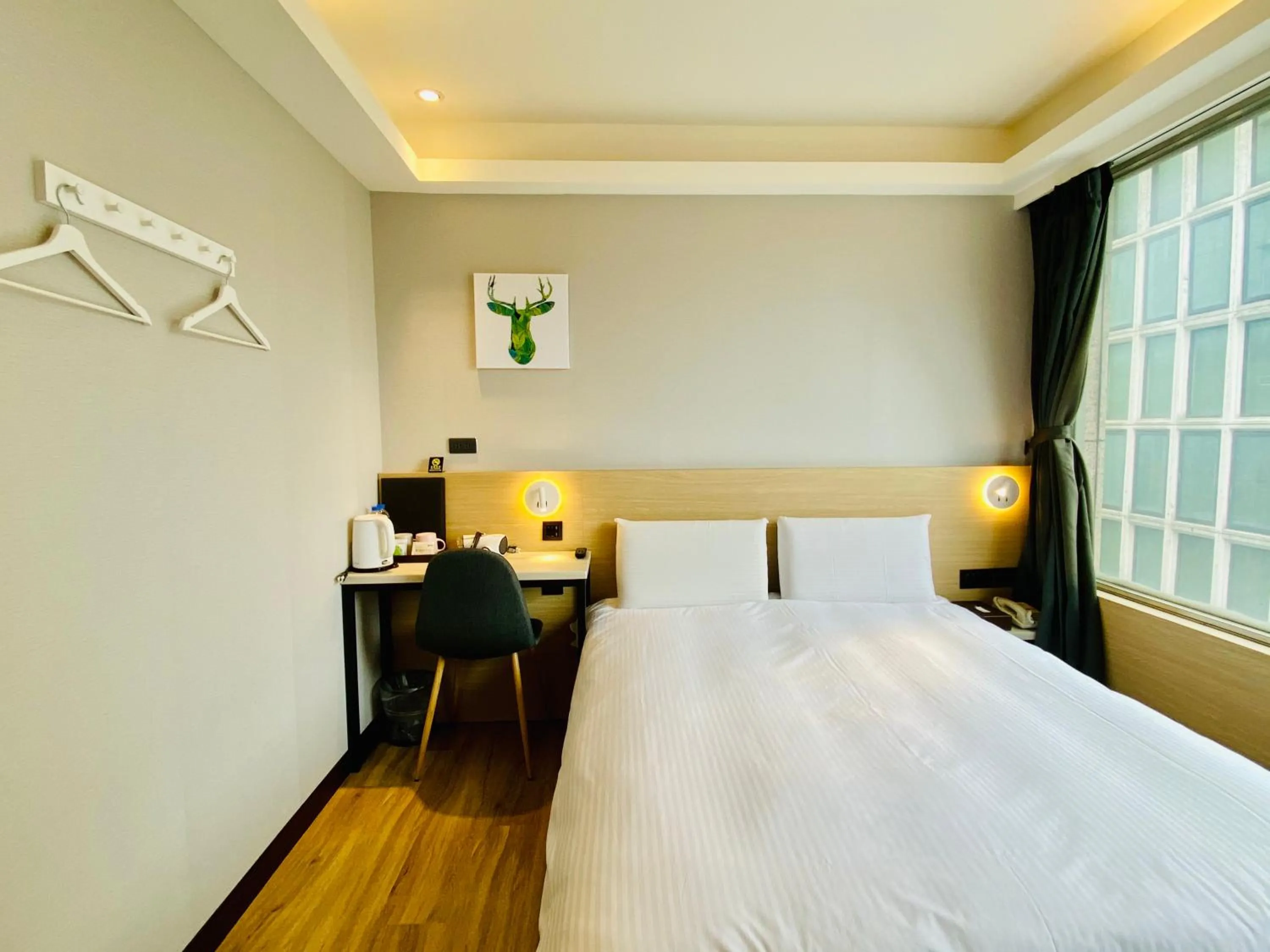 Photo of the whole room, Bed in Hub Hotel Songshan Inn