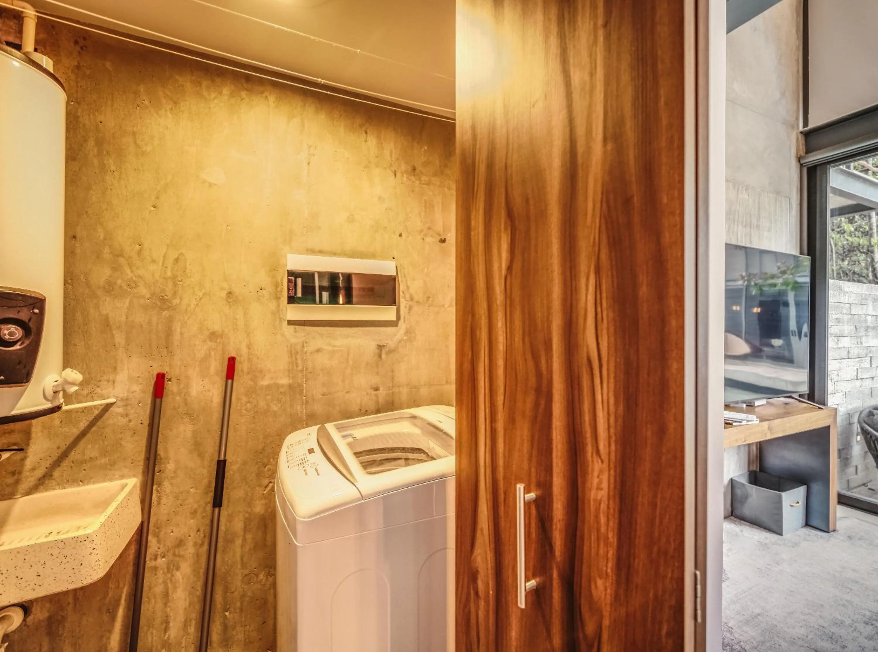 washing machine in Incredible 1BR Swim Up with Private Cenote and Big Gym