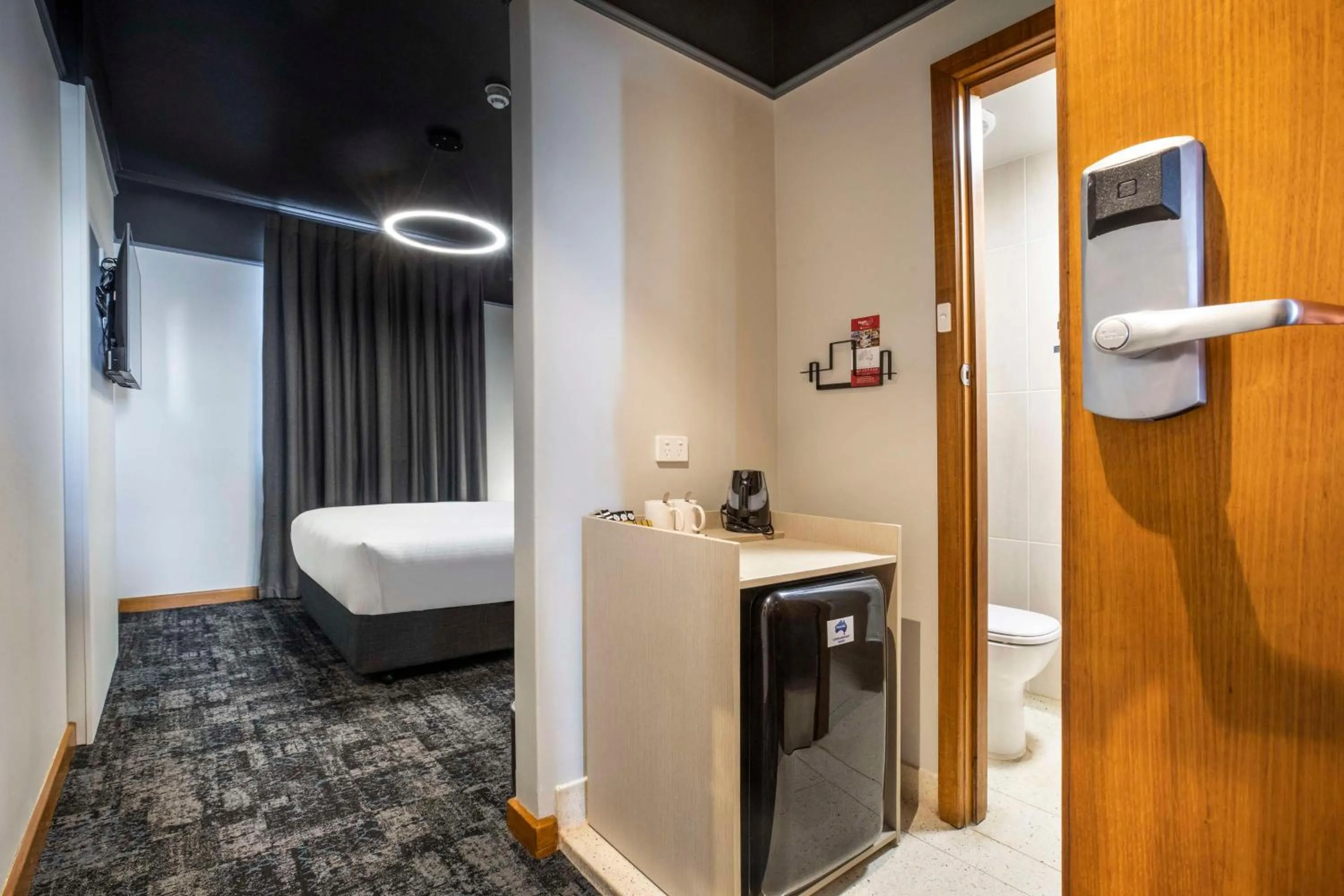 Bedroom, Bed in Nightcap at Empire Hotel